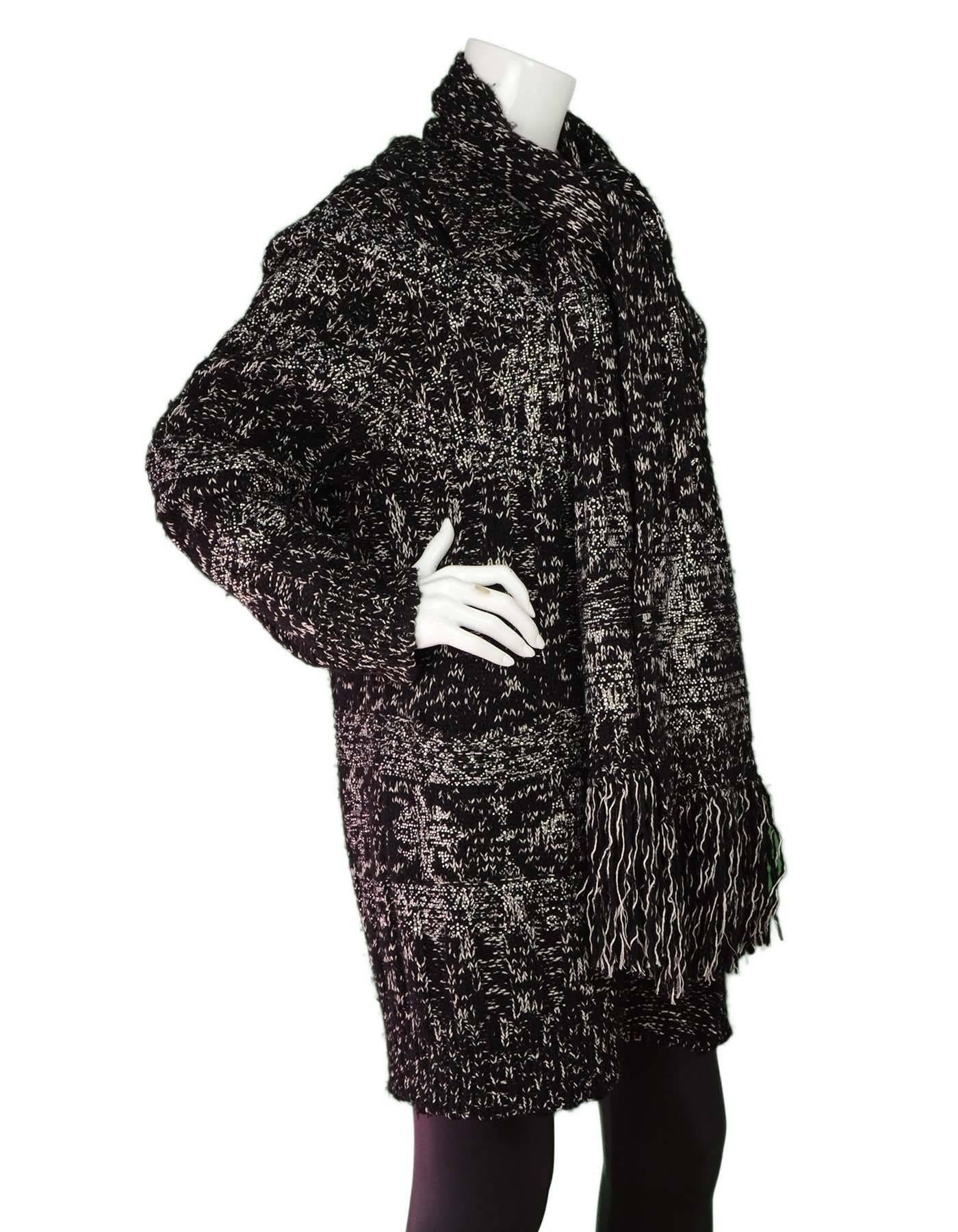Chanel Black & White Chunky Knit Cardigan & Scarf Set 
Both cardigan and scarf feature clear crystal details throughout
Made In: Italy
Color: Black and white
Composition: 52% wool, 18% cashmere, 16% cotton, 7% paper, 3% silk, 3% polyester, 1%
