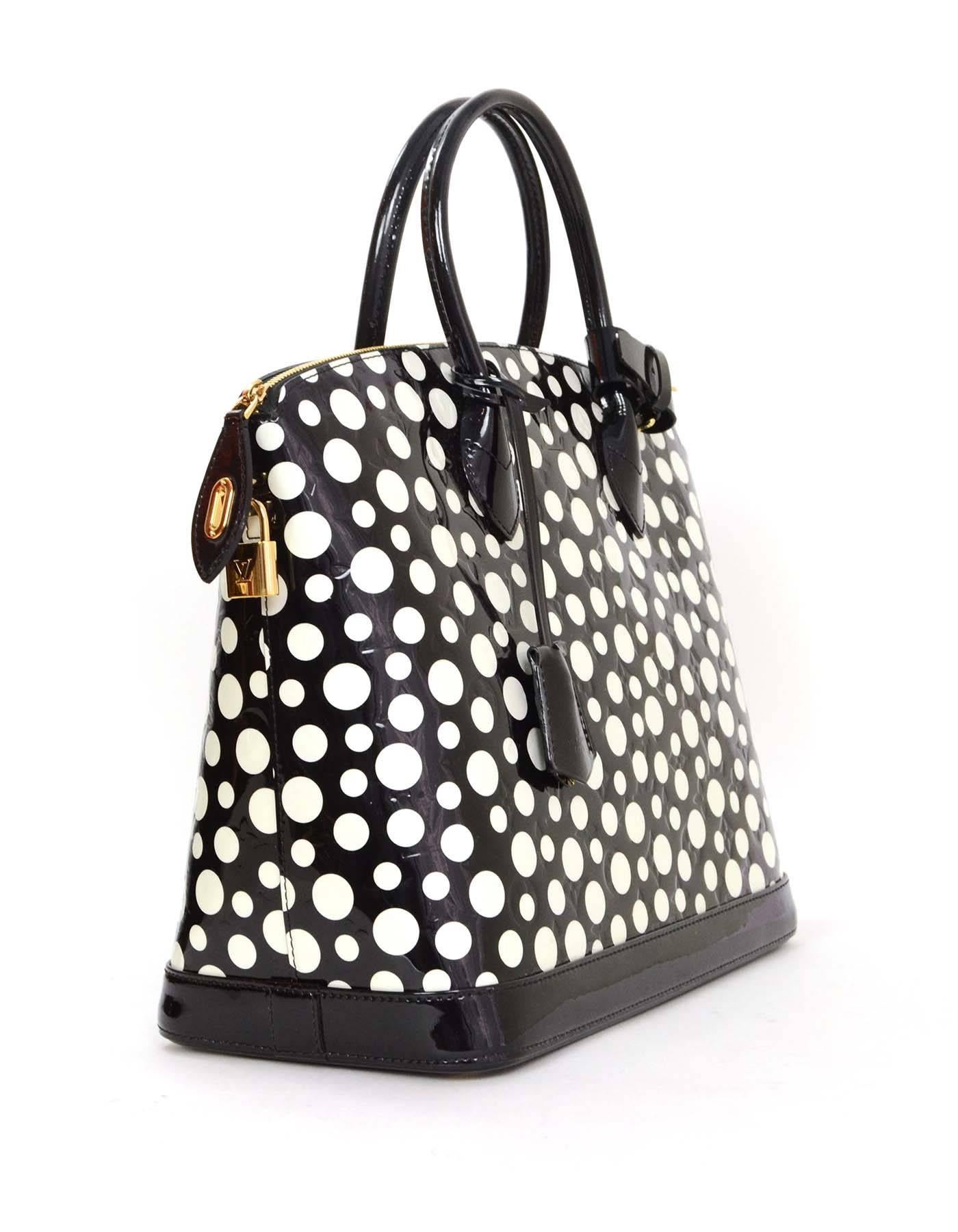 Louis Vuitton Yayoi Kusama Dots Infinity Vernis Lockit MM Bag
Made In: France
Year of Production: 2012
Color: Black and white 
Hardware: Goldtone
Materials: Vernis (patent leather)
Lining: Black and white polka dot canvas
Closure/Opening: Zip