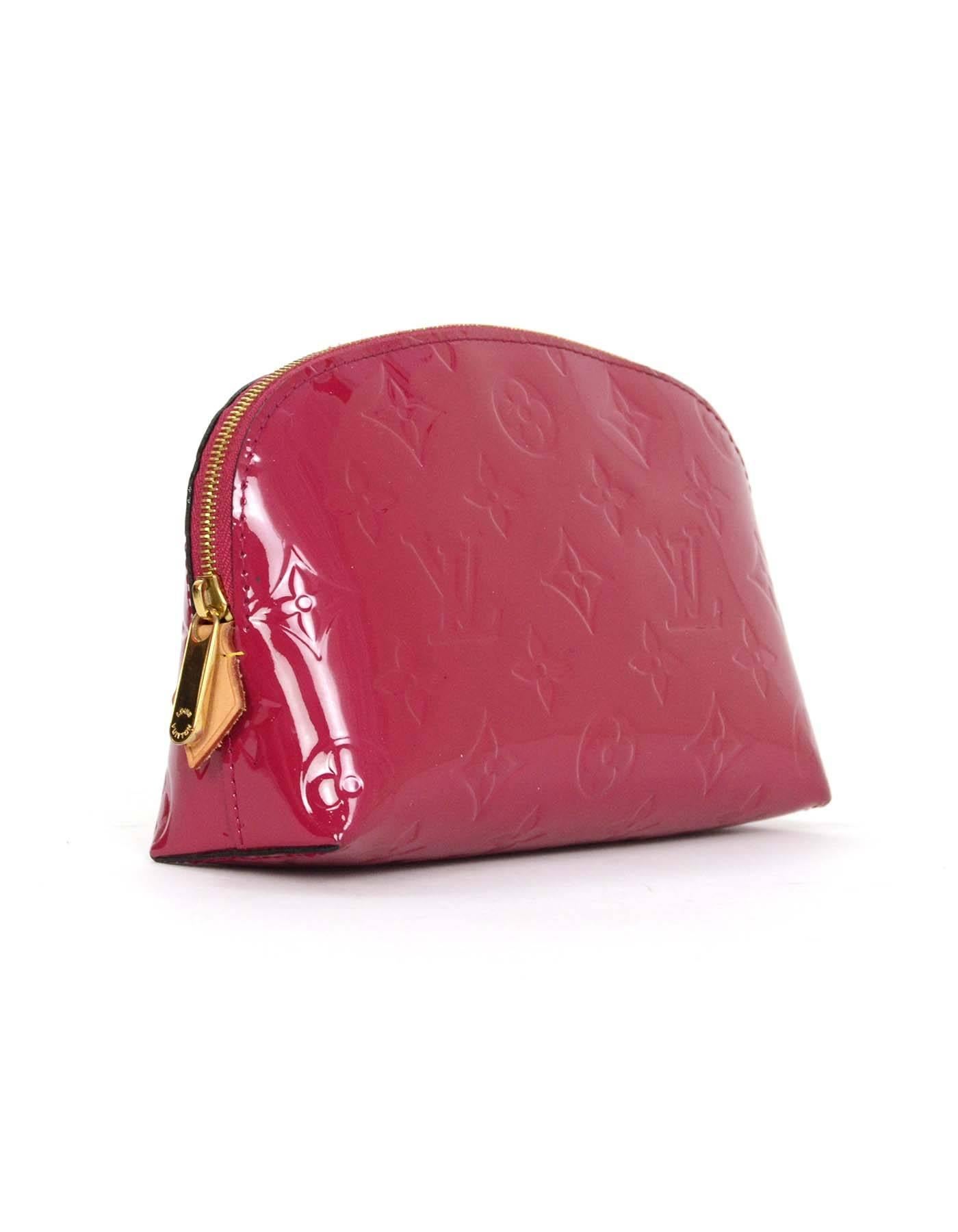 Louis Vuitton Magenta Vernis Cosmetic Pouch
Made in: France
Year of Production: 2015
Color: Magenta
Hardware: Goldtone
Materials: Vernis leather (patent leather)
Lining: Magenta textile
Closure/opening: Zip across top
Exterior Pockets: