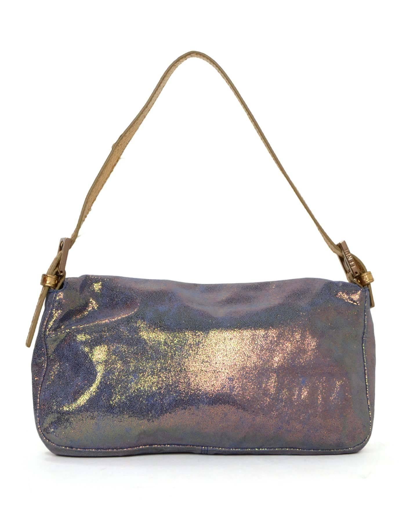 Fendi Purple Iridescent Sueded Leather Baguette 
Features gold python trim and logo buckle with marbleized background

    Made In: Italy
    Color: Iridescent purple and gold
    Hardware: Light goldtone
    Materials: Sueded leather and