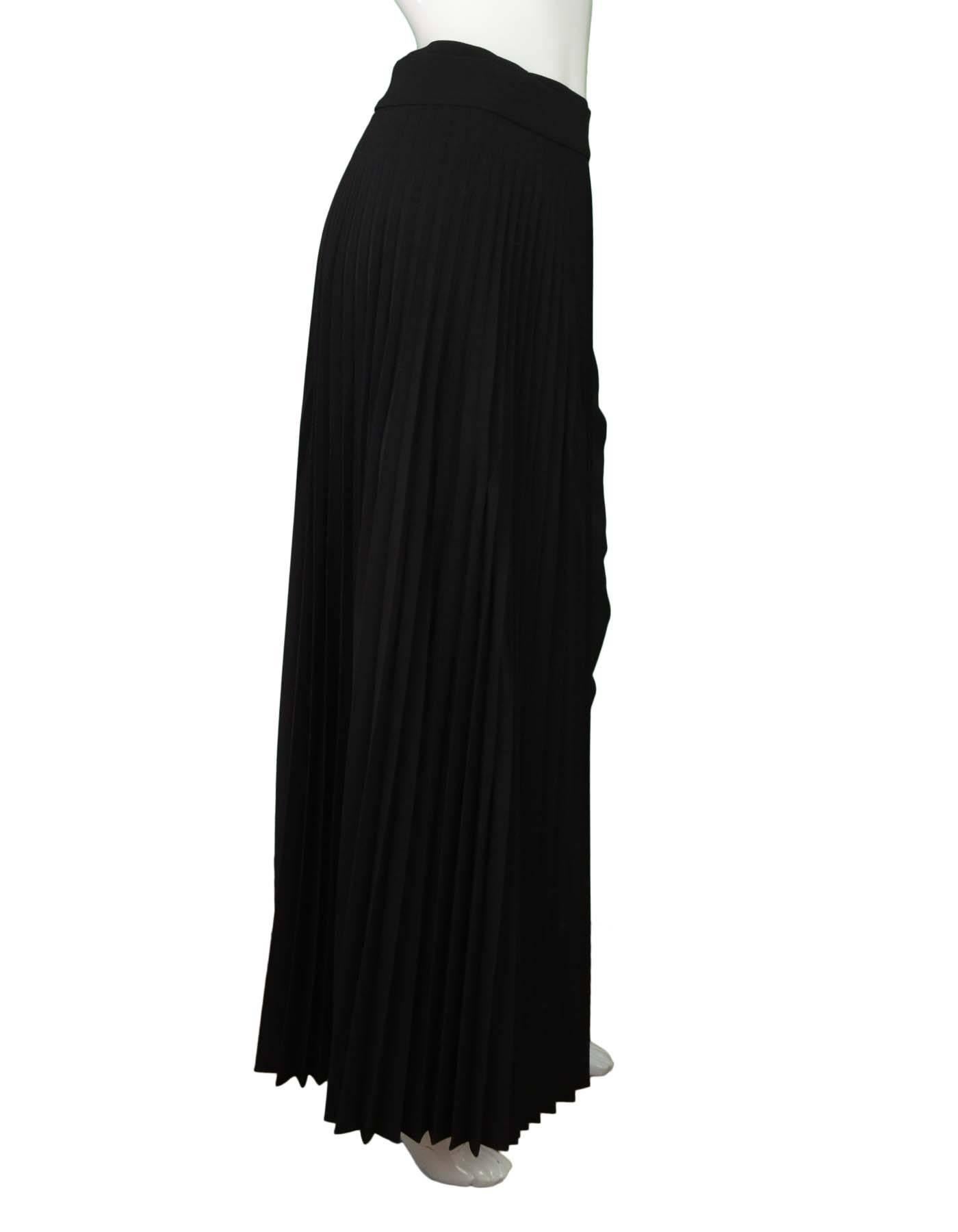 Brunello Cucinelli Black Long Pleated Wrap Skirt 
Features pleated panel and non-pleated panel
Made In: Italy
Color: Black
Composition: 52% wool, 40% polyester, 5% polyamide, 3% elastane
Lining: 68% acetate, 32% polyester
Closure/Opening: Side
