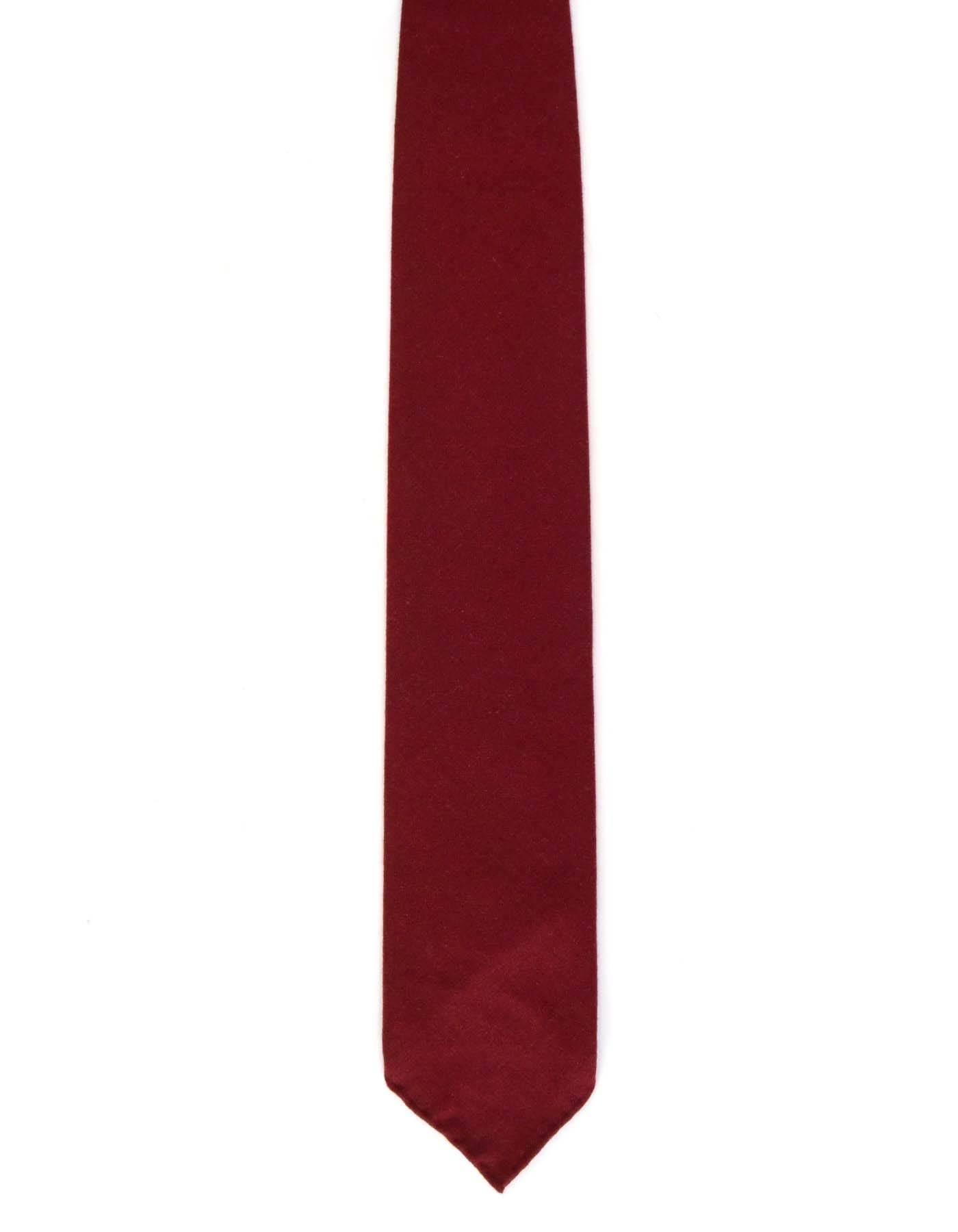 Hermes Burgundy Cashmere Tie
Made In: France
Color: Burgundy
Composition: 100% cashmere
Overall Condition: Excellent pre-owned condition
Measurements: 
Length: 60