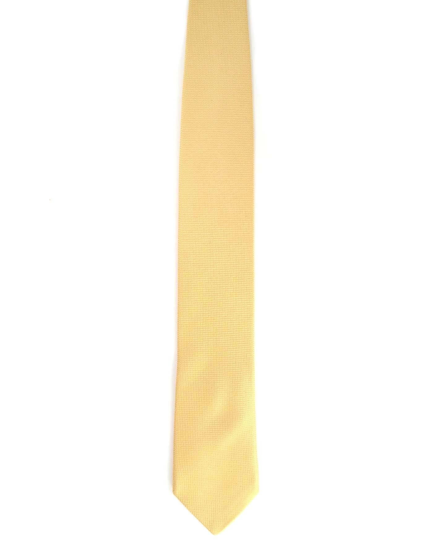 Hermes Gold Woven Silk Tie
Made In: France
Color: Yellow-gold
Composition: 100% silk
Overall Condition: Excellent pre-owned condition with the exception of a few small pulls to front
Measurements: 
Length: 59