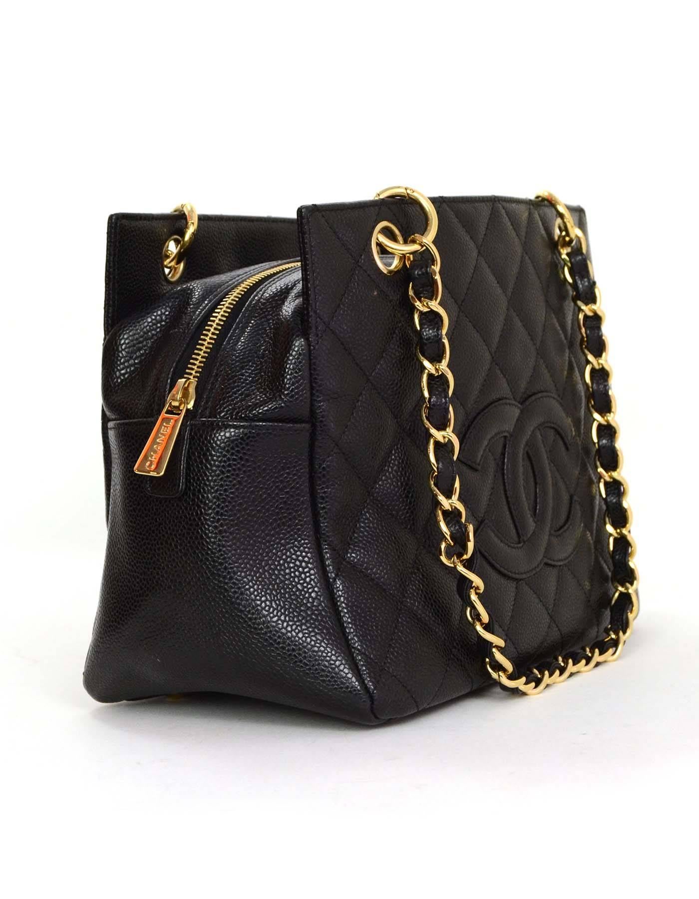 Chanel Black Caviar Timeless Tote
Features stitched CC on front of bag and quilting throughout with classic leather laced chain straps

-Made in: Italy
-Year of Production: 2005-2006
-Color: Black
-Hardware: Goldtone
-Materials: Caviar