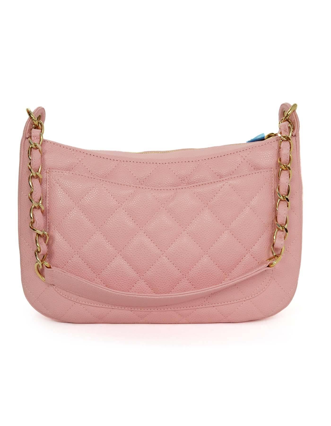 Chanel Pink Caviar Timeless CC Bag 
Features quilting throughout and Timeless CC stitched on front panel of bag
Made In: Italy
Year of Production: 2003-2004
Color: Pink
Hardware: Goldtone
Materials: Caviar leather
Lining: Tan