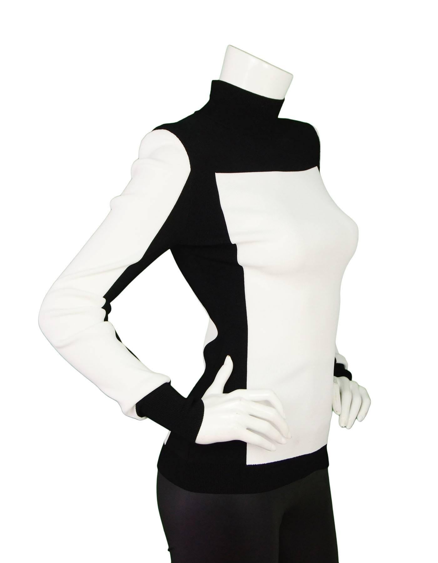 Balmain x H&M Black and White Turtleneck Sz 6

Features gold-tone back zip closure and light shoulder padding

Color: Black and white
Composition: 989% Viscose, 10% polyamide, 1% elastane
Lining: None
Closure/Opening: Zip closure at