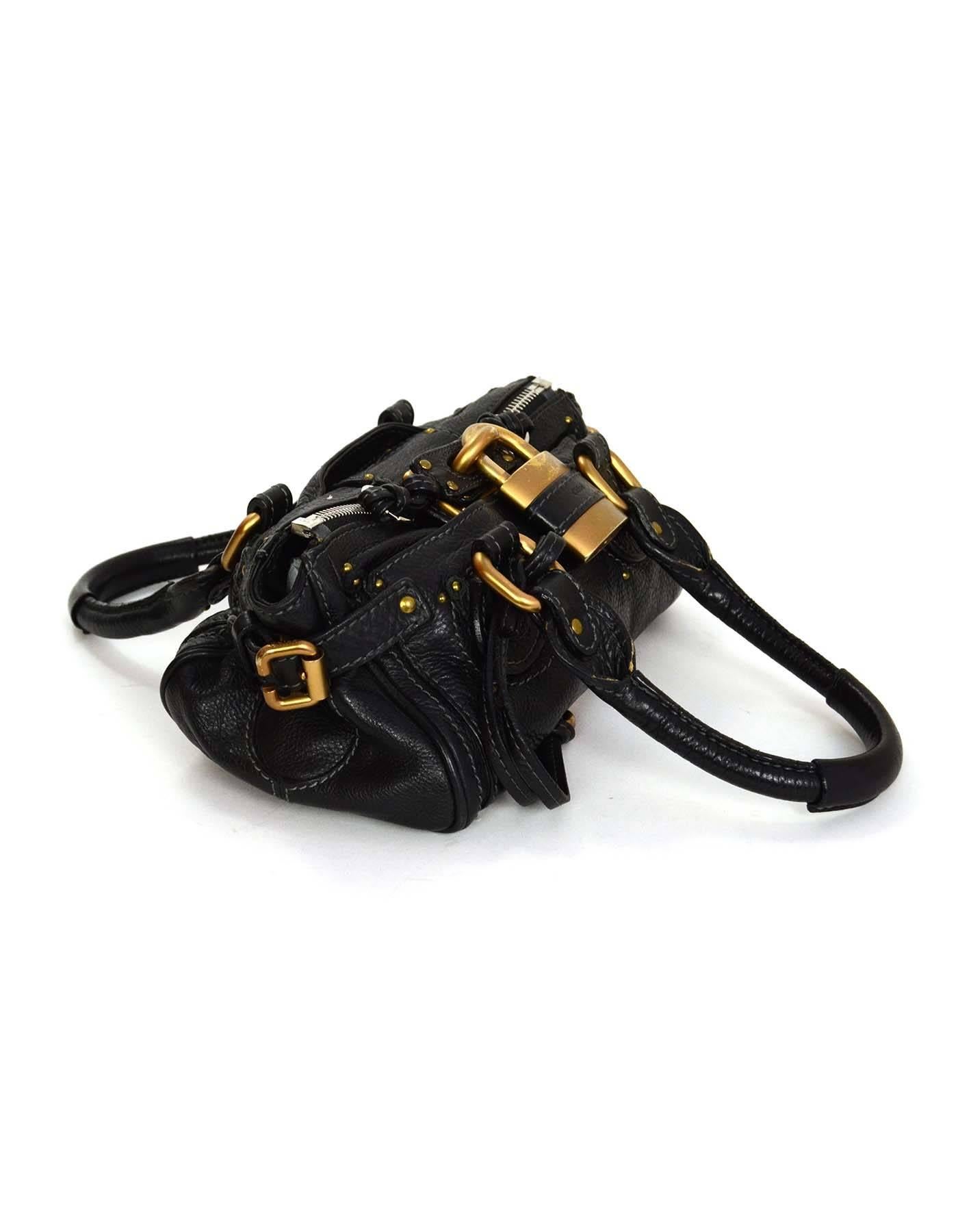 Chloe Black Leather Mini Paddington Bag 
Features oversized Chloe padlock 
Made In: Italy
Color: Black
Hardware: Goldtone and silvertone
Materials: Leather
Lining: Black canvas
Closure/Opening: Dual sided zipper closure that meet in middle