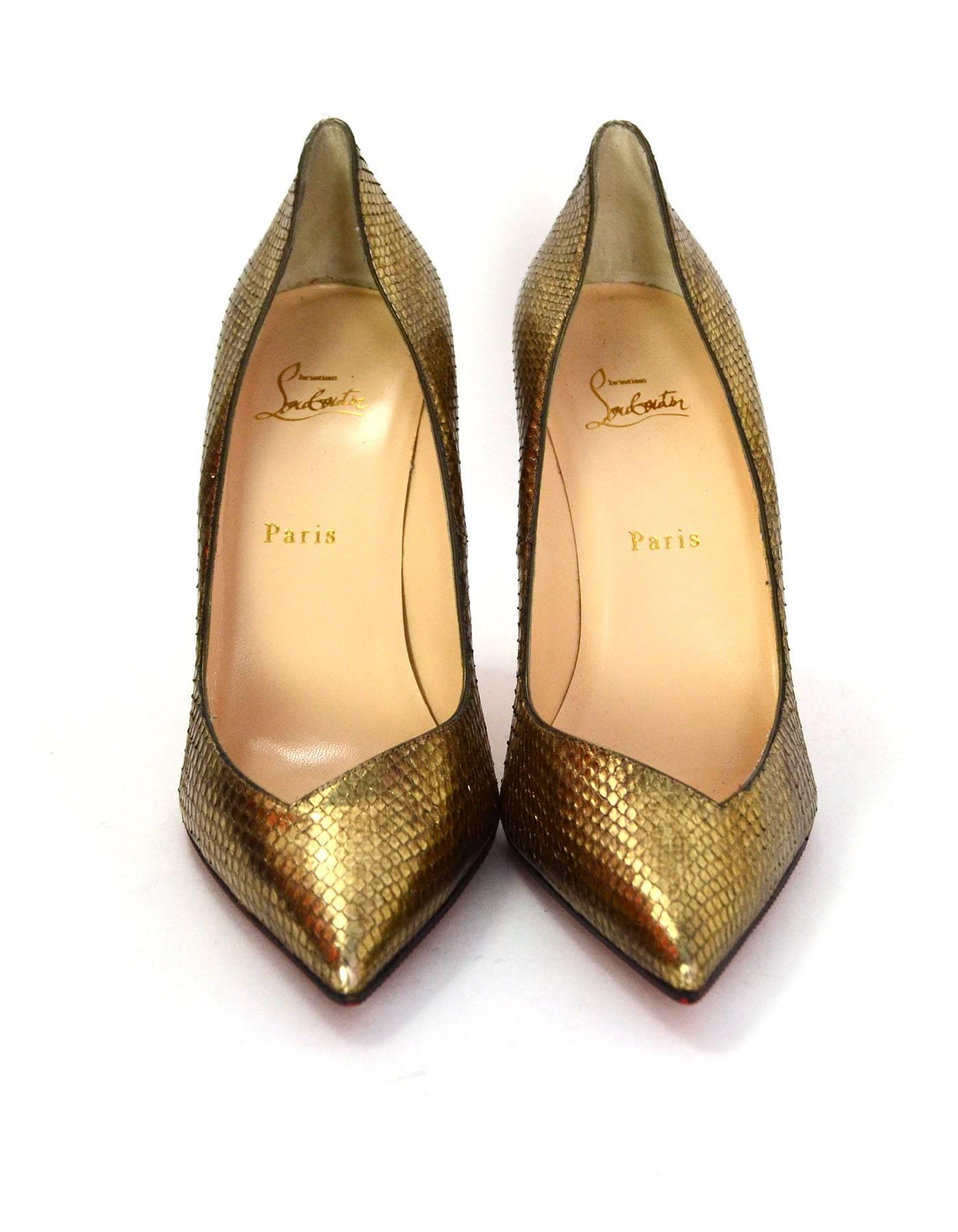 Christian Louboutin Antic Gold Python Completa 100 Pumps

Made In: Italy
Color: Antic gold
Materials: Python
Closure/Opening: Slide on
Sole Stamp: Christian Louboutin Made in Italy 42
Overall Condition: Very good pre-owned condition, have