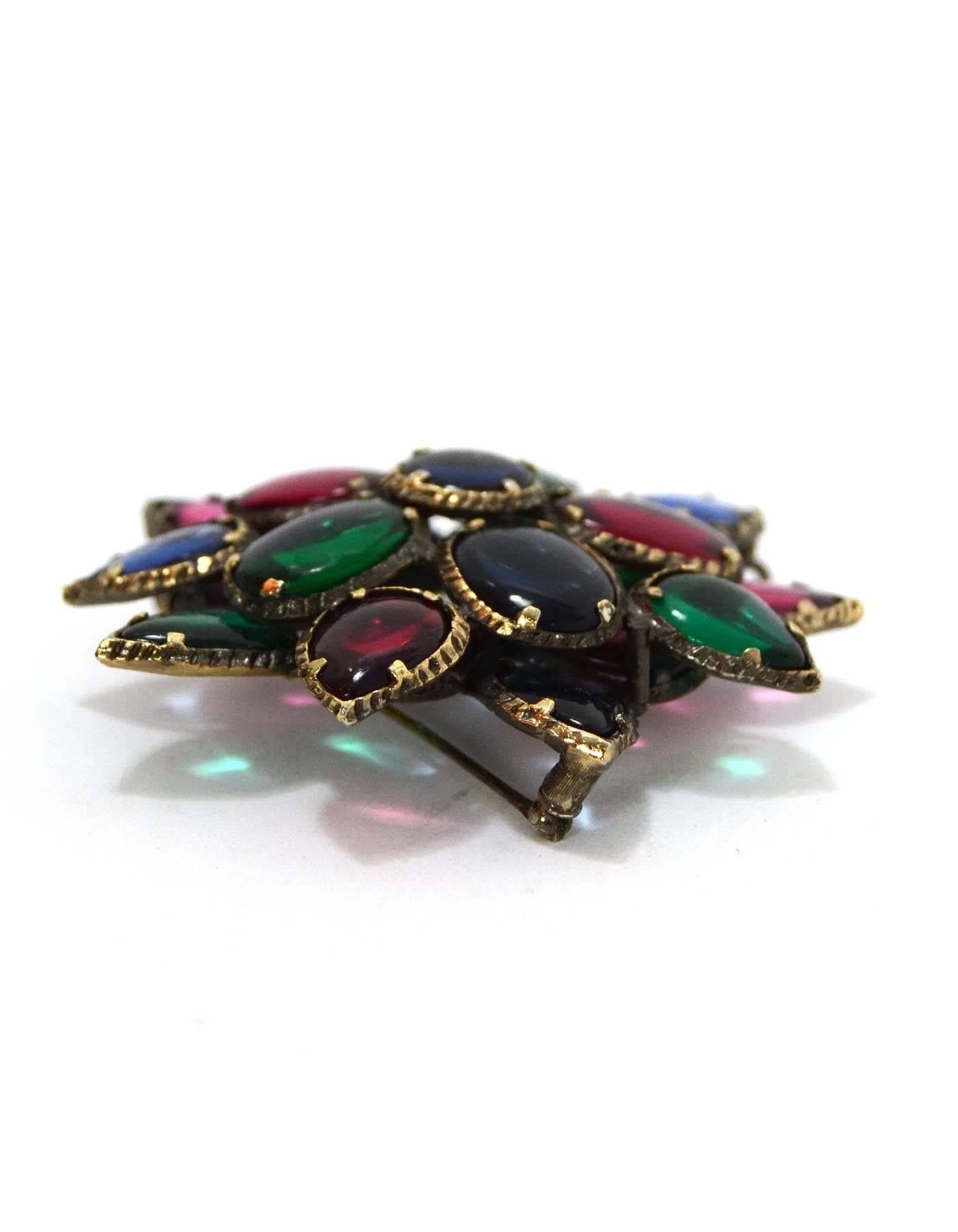 Chanel Multi-Color Gripoix Cluster Flower Brooch
Features extra hook on back on pin to wear as a pendant
Color: Gunmetal, red, blue and green
Materials: Metal and gripoix
Closure: Pin back closure
Overall Condition: Excellent vintage, pre-owned