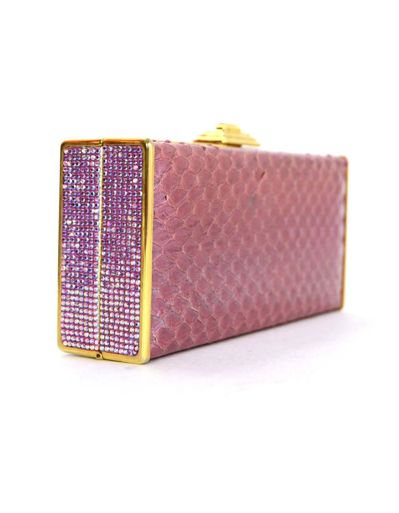 Judith Leiber Iridescent Pink Python & Crystal Minaudiere 
Features pink Swarovski crystal trim throughout and optional goldtone chain link shoulder strap
Made In: U.S.A
Color: Iridescent pink and goldtone
Hardware: Goldtone
Materials: Python,