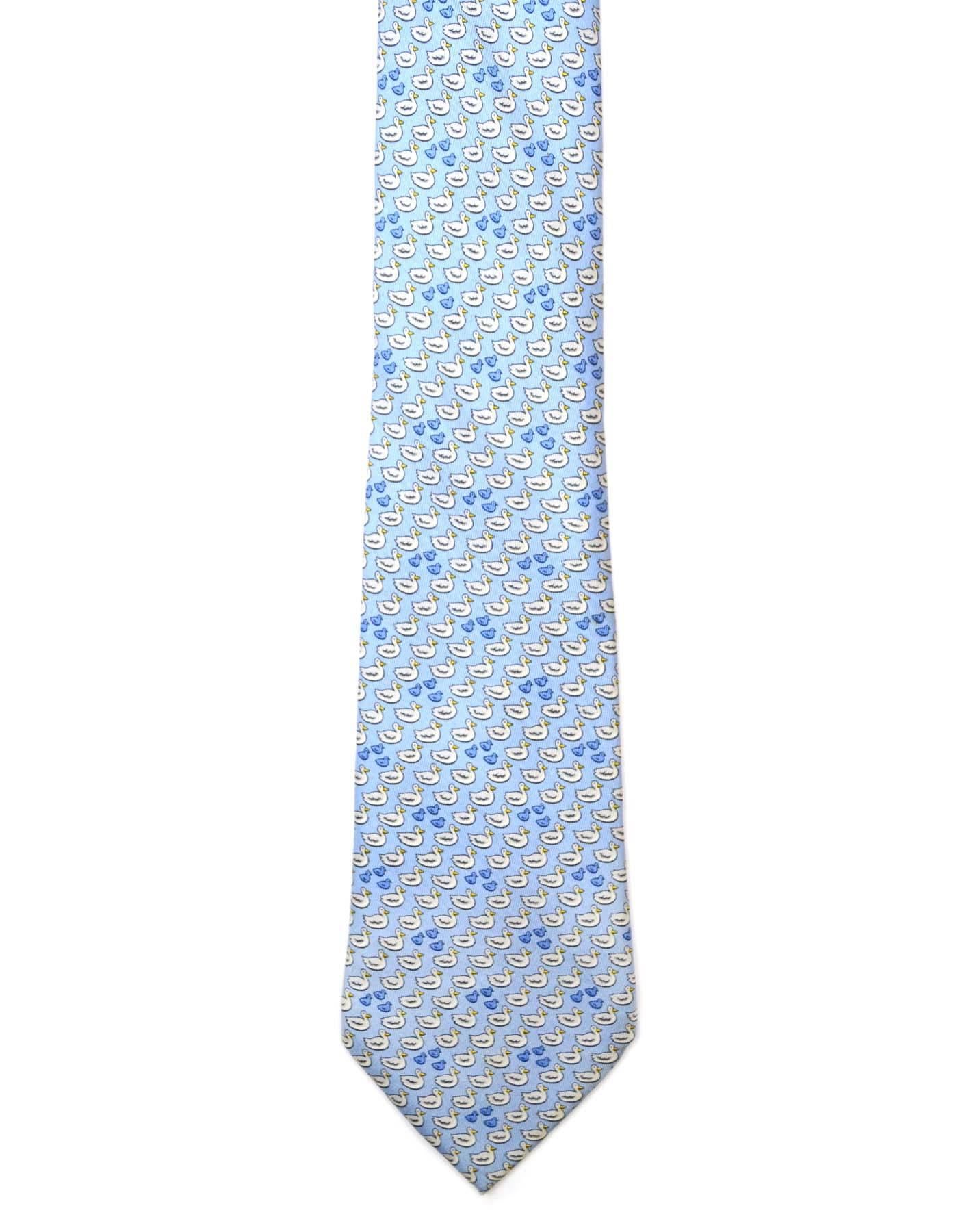 Hermes Pale Blue Duck Print Silk Tie
Made In: France
Color: Pale blue
Composition: 100% silk
Overall Condition: Excellent pre-owned condition with the exception of some faint soiling to back side of tie at bottom 
Measurements: 
Length: