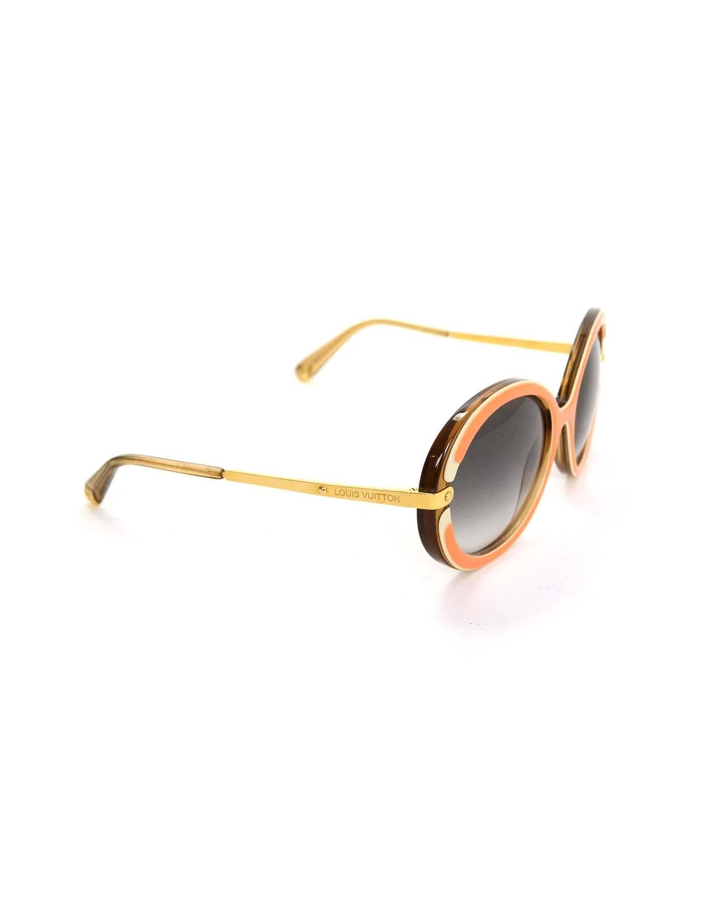 Louis Vuitton Orange & White Resin Anthea Sunglasses 
Features bronze glitter resin framing inside of lenses
Made In: Italy
Color: Orange, white and goldtone
Materials: Resin and metal
Stamp: Z0426W 57 18
Overall Condition: Excellent pre-owned