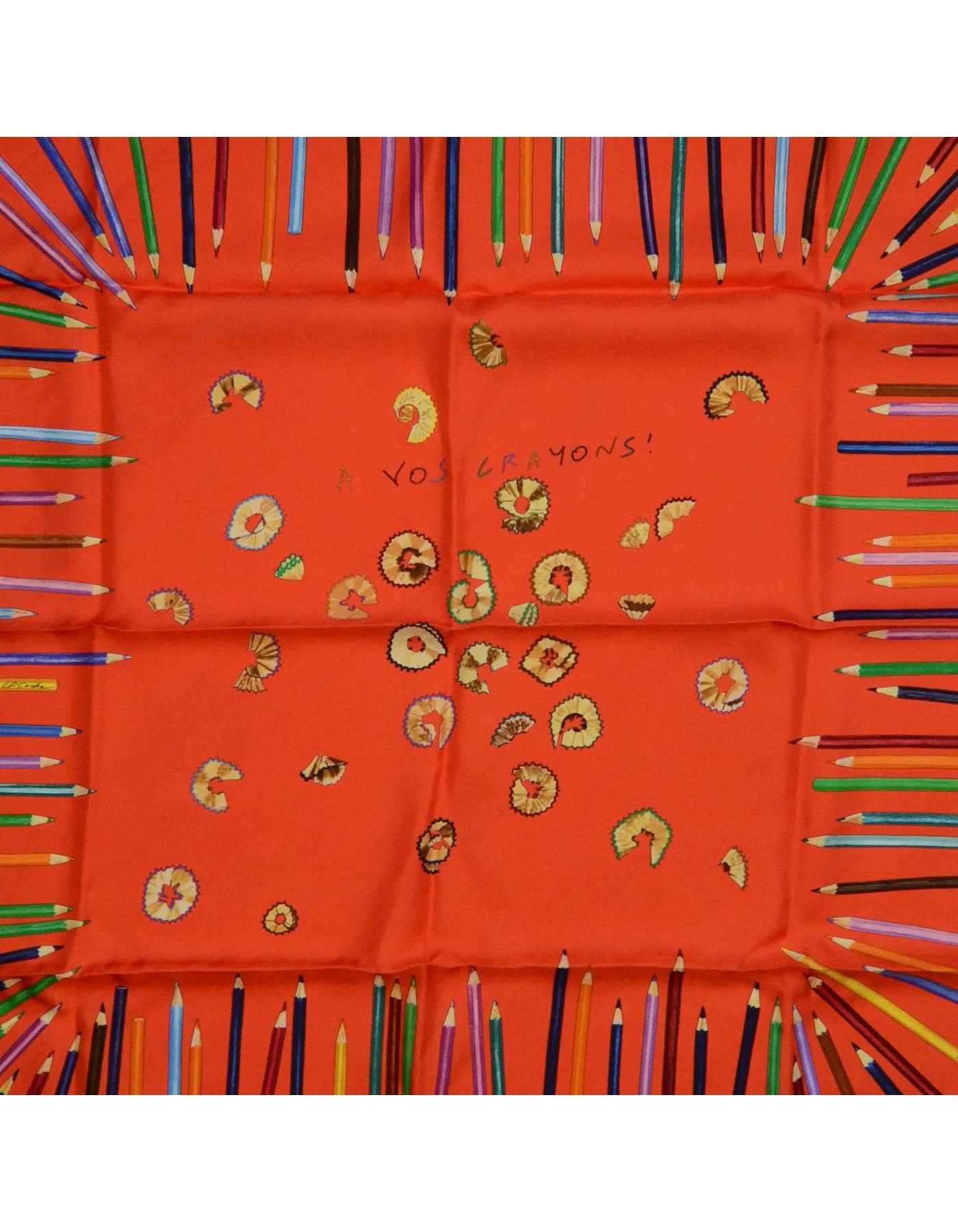 Hermes Orange 'A Vos Crayons!' Silk 90cm Scarf
Print features different colored pencils surrounding pencil shavings. Designed by artist Leigh Cooke

    Made in: France
    Color: Orange with multicolored pencils
    Composition: 100% Silk
   