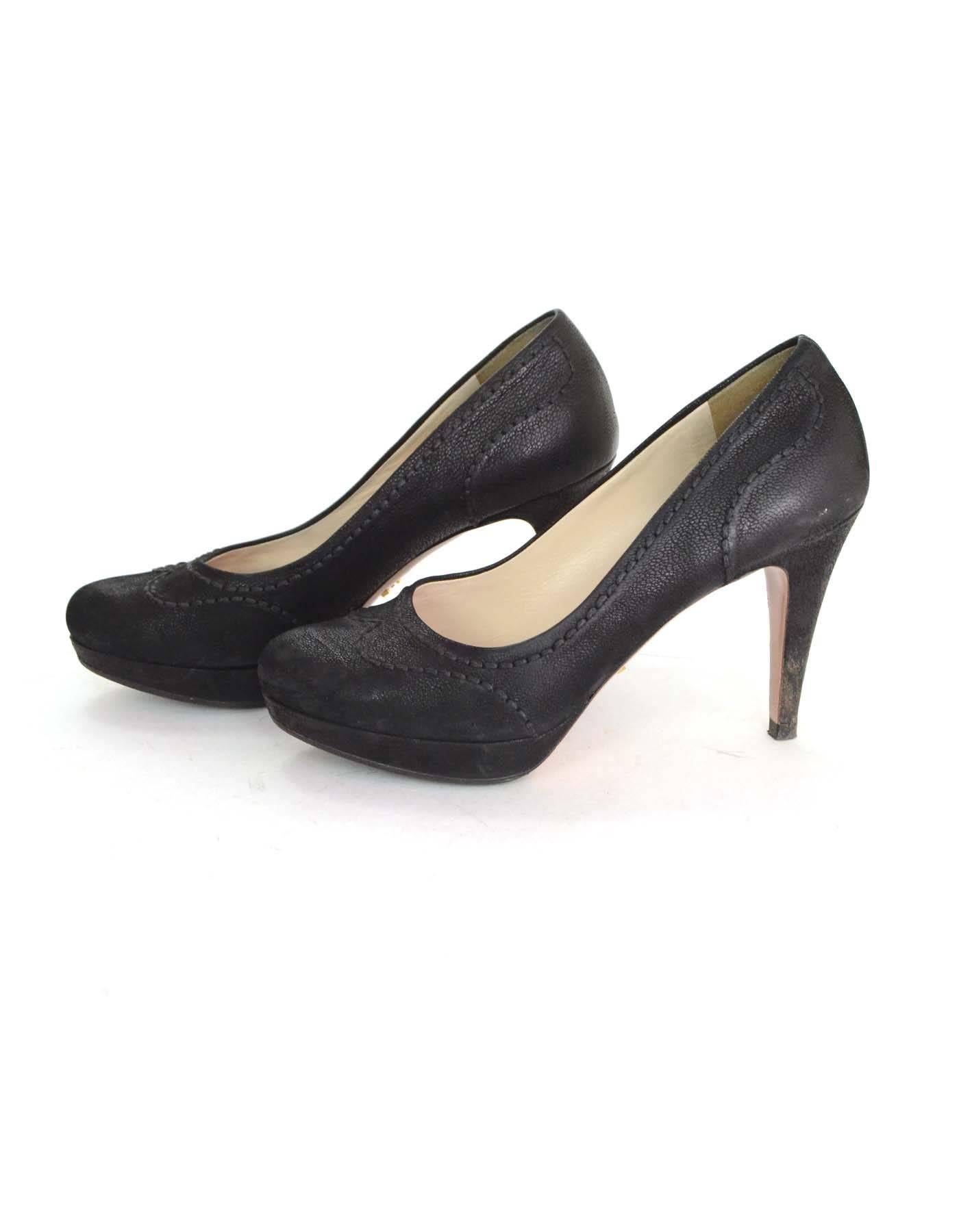 Prada Black Almond Toe Pumps Sz 36.5

Features stitching throughout

Made in: Italy
Color: Black
Materials: Leather
Closure/opening: Slide on
Sole Stamp: Prada 36.5 Made in Italy
Overall Condition: Very good pre-owned condition with the