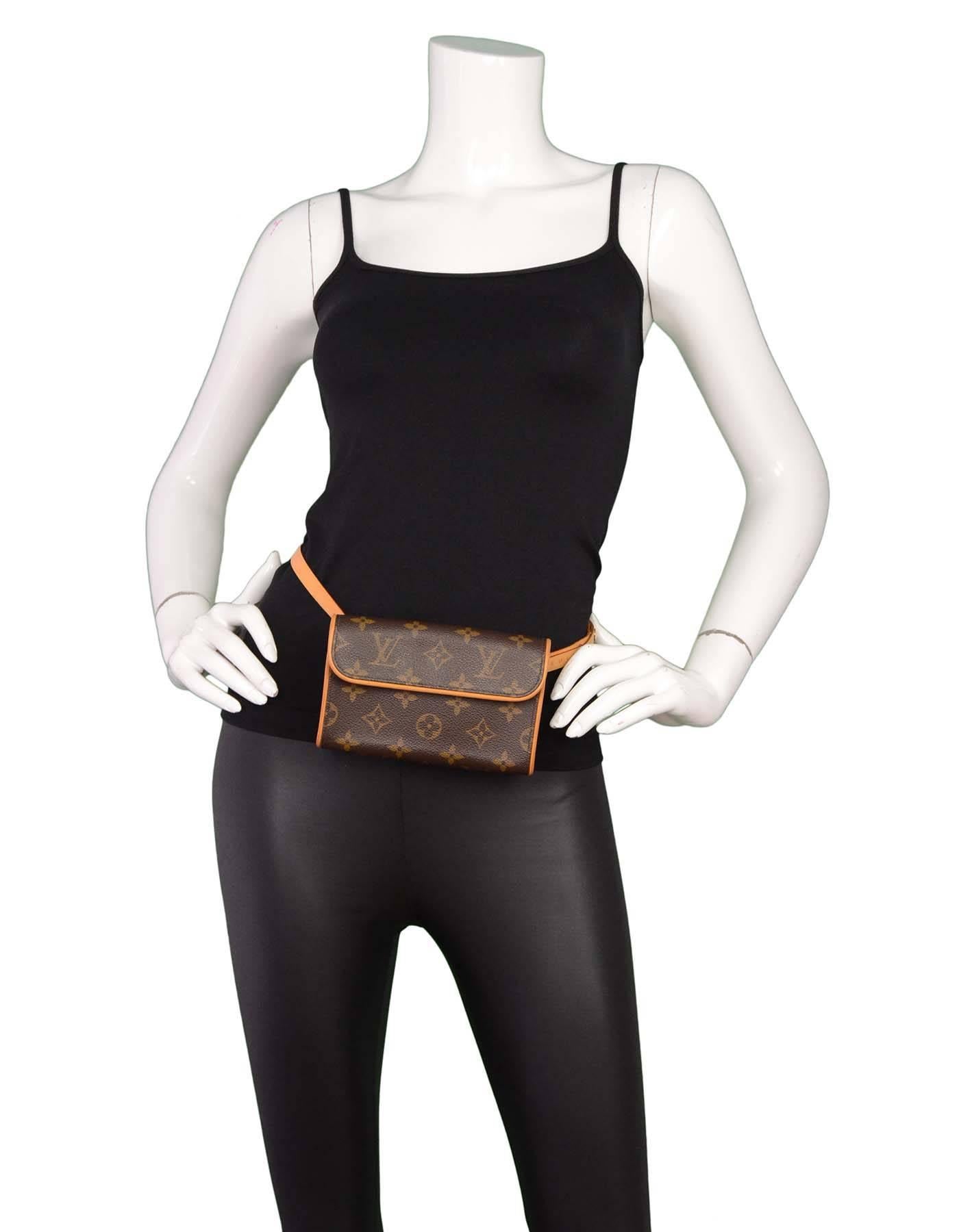 Louis Vuitton Monogram Pochette Florentine Belt Bag
Features adjustable belt

Made In: France
Year of Production: 2002
Color: Brown
Materials: Coated canvas and vachetta leather
Lining: Tan suede
Hardware: Gold-tone
Closure: Flap top with