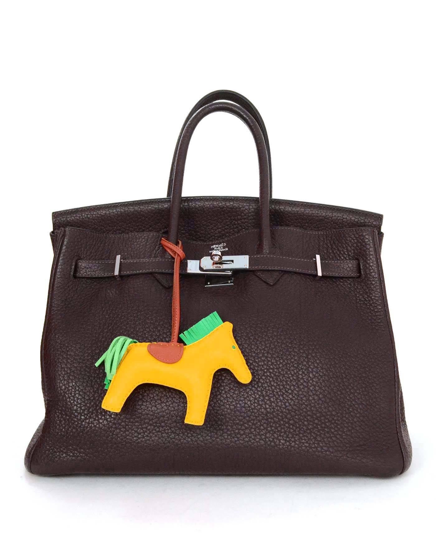 Hermes Lime Yellow, Menthe Green & Fauve Brown Rodeo Horse Charm 

-Made In: France
-Color: Lime yellow, menthe green, and fauve brown
-Materials: Lambskin leather
-Closure/Opening: None
-Stamp: Hermes Paris Made in France
-Overall