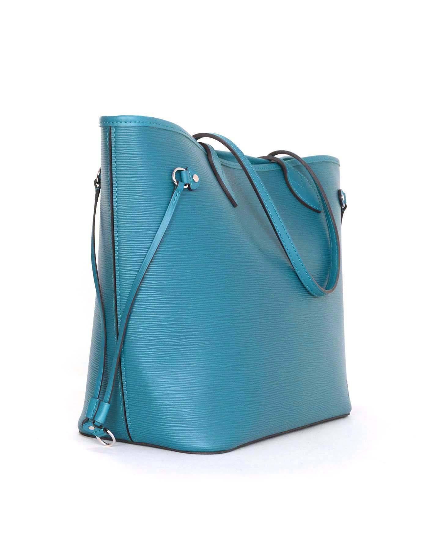 Louis Vuitton Cyan Neverfull MM
Features removable insert that can be used as a wallet, clutch, or pouch separate from the bag

    Made in: Spain
    Year of Production: 2013
    Color: Teal
    Hardware: Silvertone
    Materials: Epi