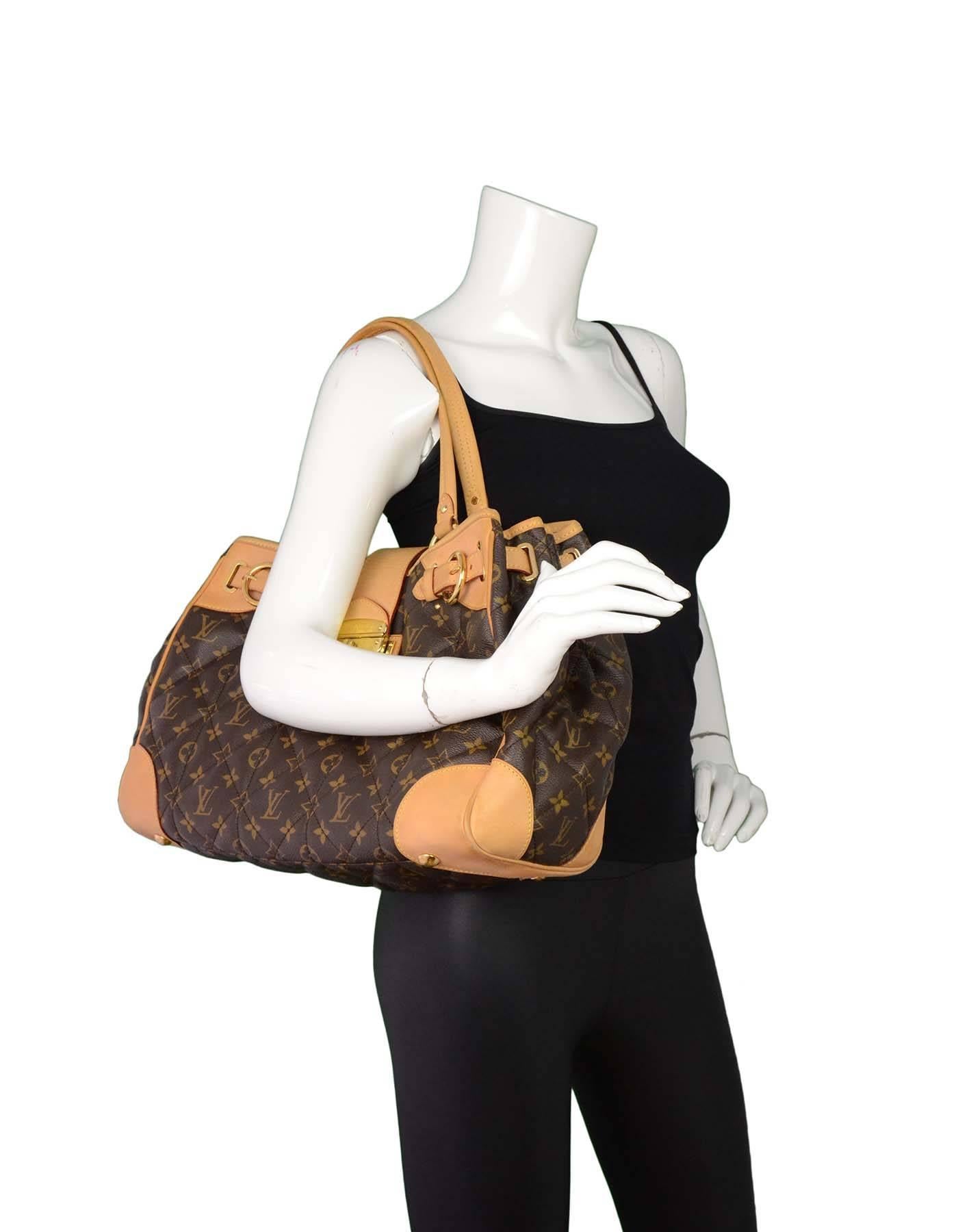 Louis Vuitton Monogram Etoile Shopper Tote with GHW

Features quilting throughout and buckle details at sides

Made In: France
Year of Production: 2009
Color: Brown
Hardware: Goldtone
Materials: Coated canvas and vachetta leather
Lining: