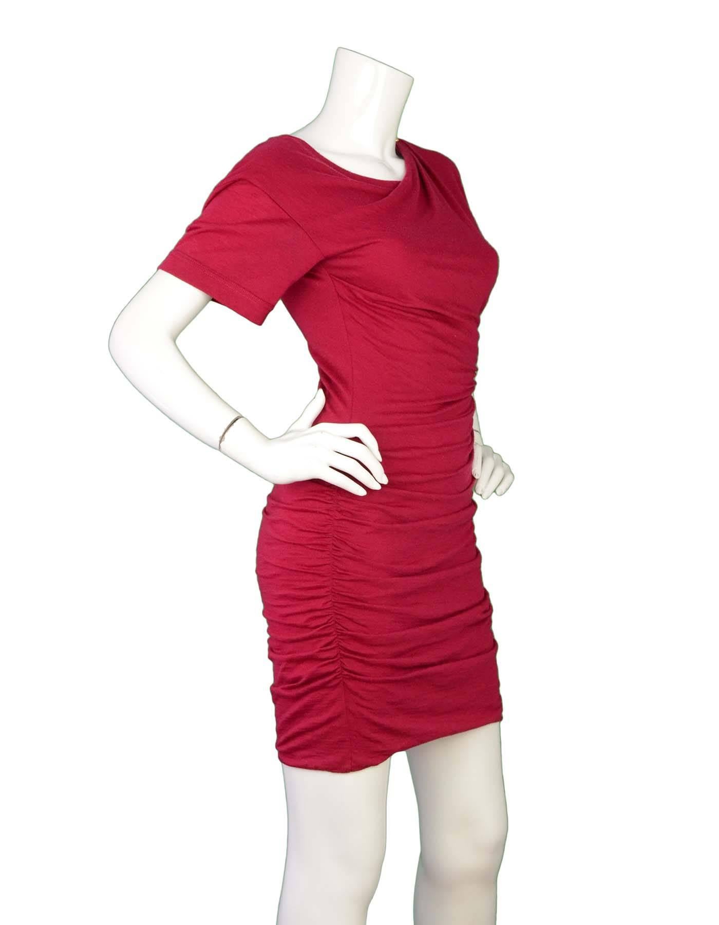 Louis Vuitton Red Wool T-Shirt Dress Sz S
Features ruching throughout and draping at neckline 

Made In: Italy
Color: Raspberry red
Composition: 90% Wool, 10% Polyamide
Lining: Black silk
Closure/Opening: Pull over
Overall Condition: