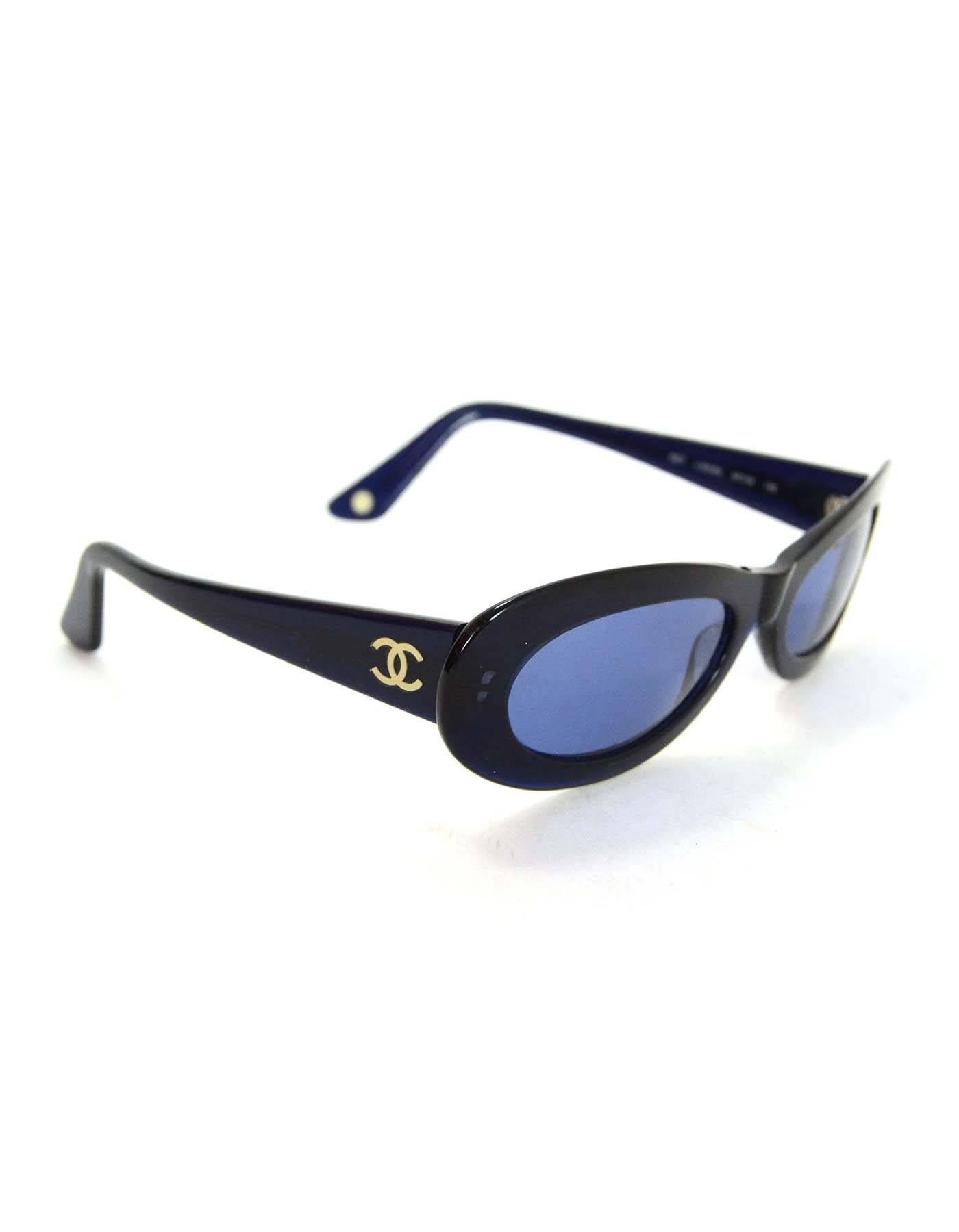 Chanel Blue Sunglasses with CC at Arms

Made In: Italy
Color: Blue
Materials: Resin
Overall Condition: Very good pre-owned condition with the exception of slightly bent arms and surface marks
Includes: Chanel case

Measurements:
Length