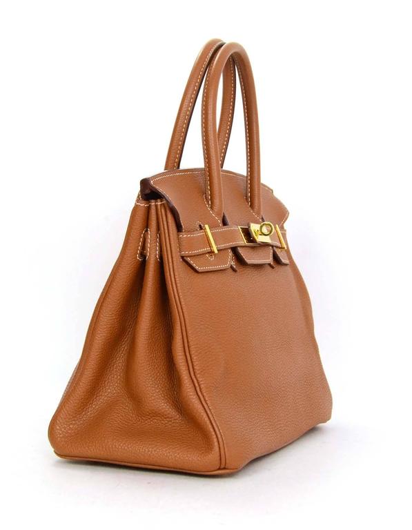 Hermes Tan Togo 30cm Birkin
Features white contrast stitching

Made in: France
Year of Production: 2006
Color: Tan 
Hardware: Goldtone
Materials: Togo leather
Lining: Tan chevre Leather
Closure/opening: Flap top with two arms and twist lock