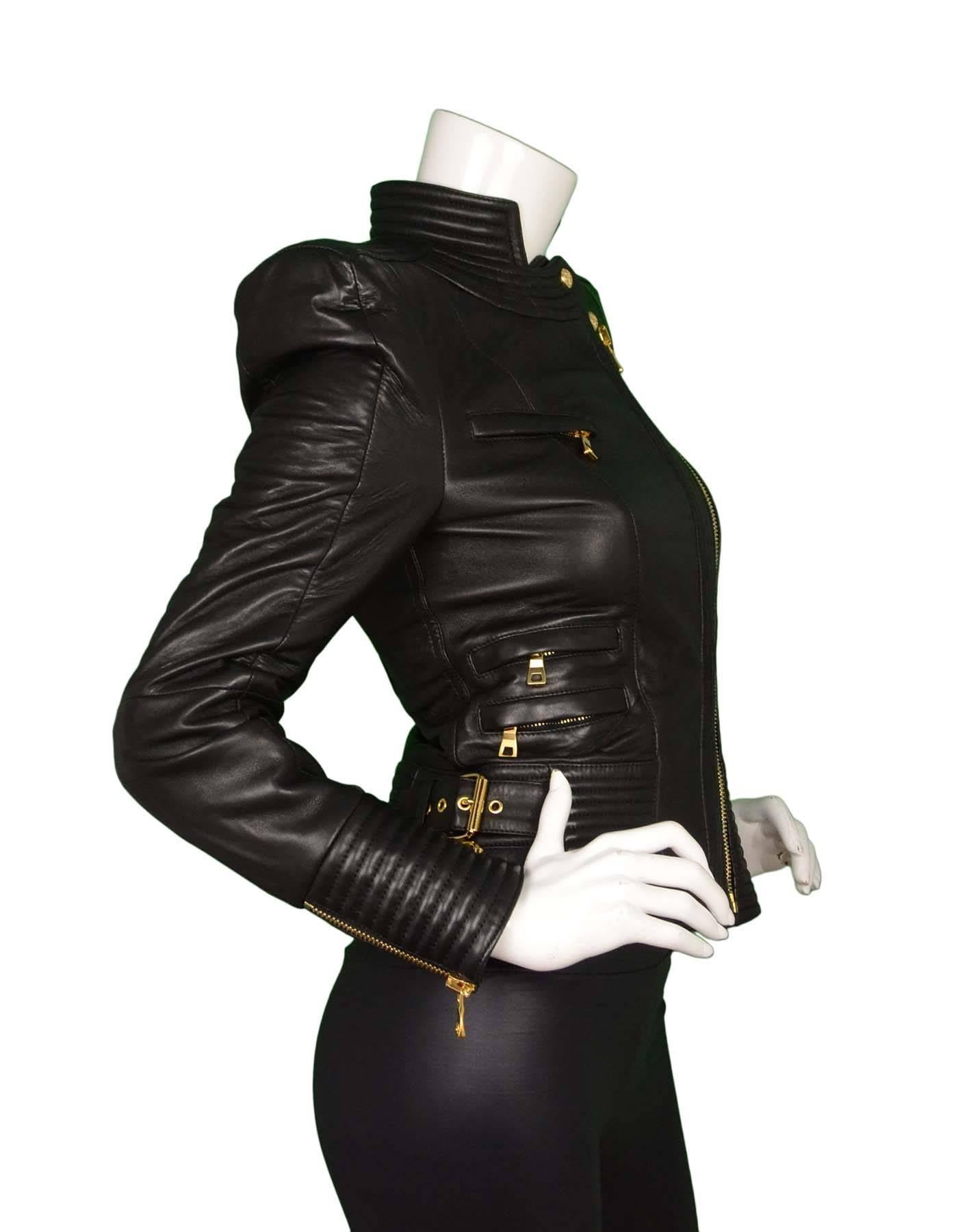 Balmain Black Quilted Leather Biker Jacket 
Features gold buckle and zipper hardware throughout
Made In: Turkey
Color: Black 
Composition: 100% leather
Lining: 52% viscose, 48% cotton
Closure/Opening: Zip front
Exterior Pockets: Five zipper