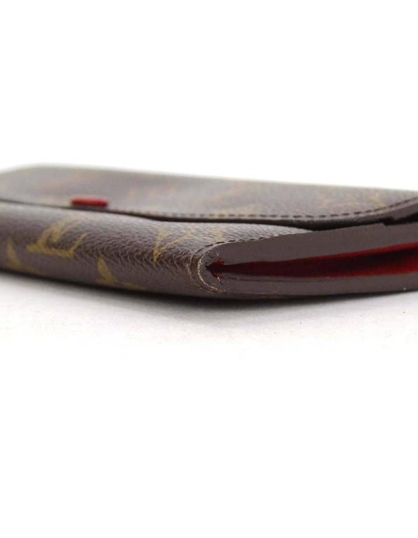 Louis Vuitton Brown Monogram Coated Canvas Emilie Wallet w/ Red Lining at  1stDibs
