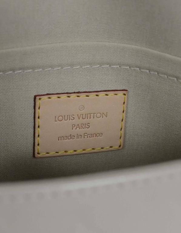 Louis Vuitton Bleu Lagoon Monogram Vernis Bellflower PM Bag Louis Vuitton |  The Luxury Closet