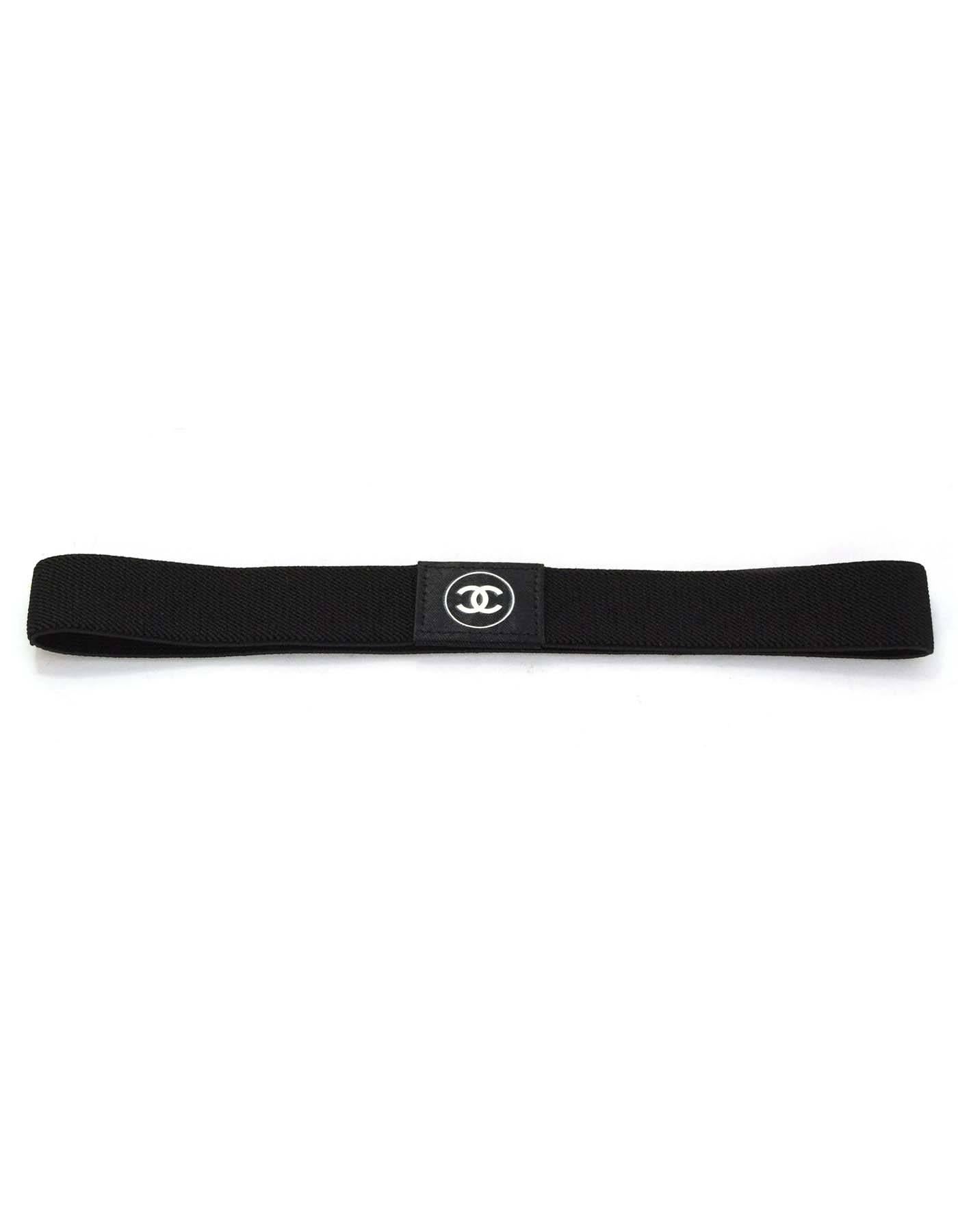 Chanel NEW Black Elastic Headband 
Features white CC patch stitched on front
Color: Black and white
Materials: Elastic and textile combo
Closure/Opening: None
Tags: Chanel Beaute
Overall Condition: Excellent-new
Measurements: 
Circumference: