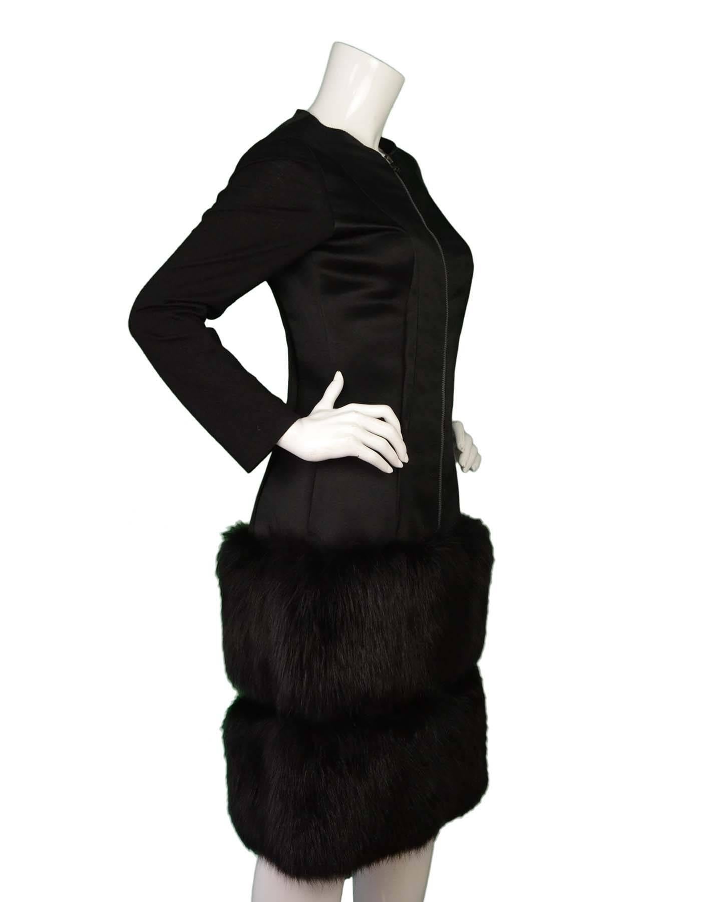 Features fox fur drop waist skirt

    Made In: France
    Year of Production: 2007
    Color: Black
    Composition: Panels of 100% silk and 100% wool
    Lining: Black silk
    Closure/Opening: Exposed zip closure at front
    Retail