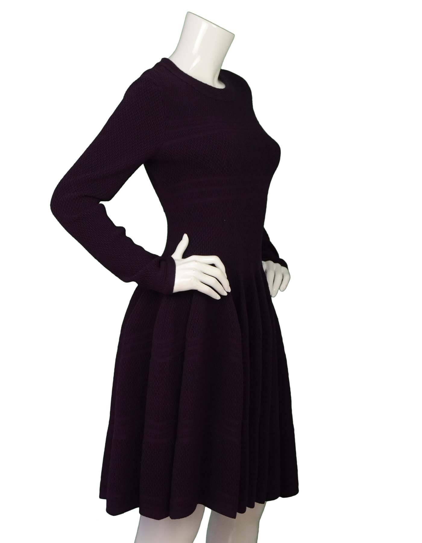 Alaia Plum Fit & Flare Dress Sz 40

Made In: Italy
Color: Plum
Composition: 55% Wool, 20% Viscose, 16% Polyester, 7% Nylon, 2% Elastane
Lining: None
Closure/Opening: Zip closure at back
Overall Condition: Excellent pre-owned
