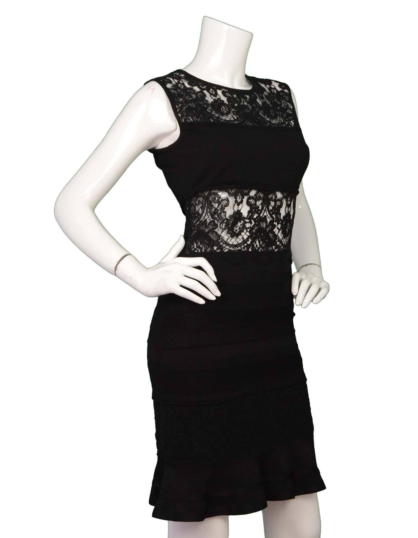 Roberto Cavalli Black Lace Sleeveless Dress Sz 40

Made In: Italy
Color: Black
Composition: 55% Rayon, 33% Wool, 11% Nylon, 1% Elasthanne
Lining: None
Closure/Opening: Hidden side zip closure
Retail Price: $1,860 + tax
Overall Condition: