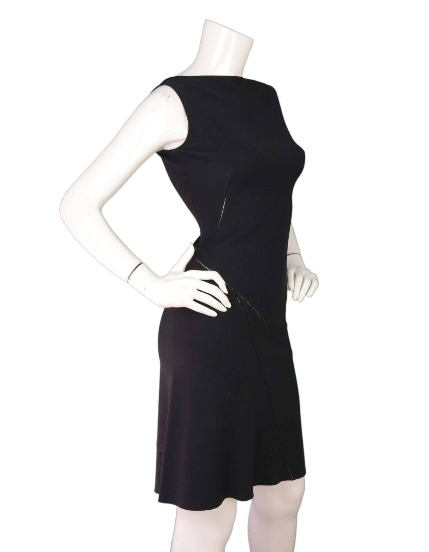 Alaia Black Sleeveless Fit Flare Dress
Features dip in back neckline
Made In: Italy
Color: Black
Composition: Silk blend textile (composition tags have faded)
Lining: None
Closure/Opening: Side zipper 
Exterior Pockets: None
Interior