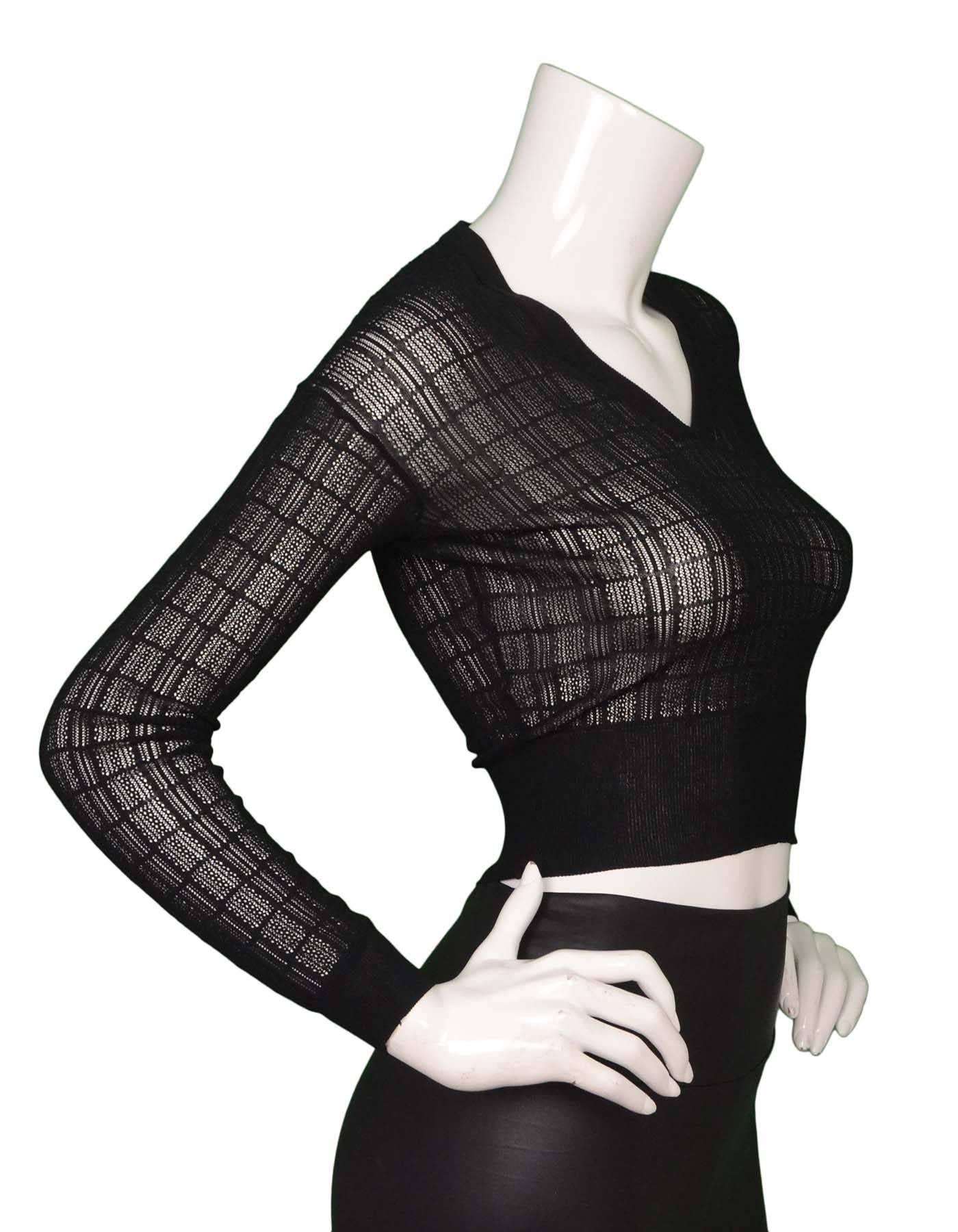 Alaia Black Knit Crop Top
Made In: Italy
Color: Black
Composition: 94% viscose, 6% polyester
Lining: None
Closure/Opening: Pull over
Exterior Pockets: None
Interior Pockets: None
Overall Condition: Excellent pre-owned condition

Marked