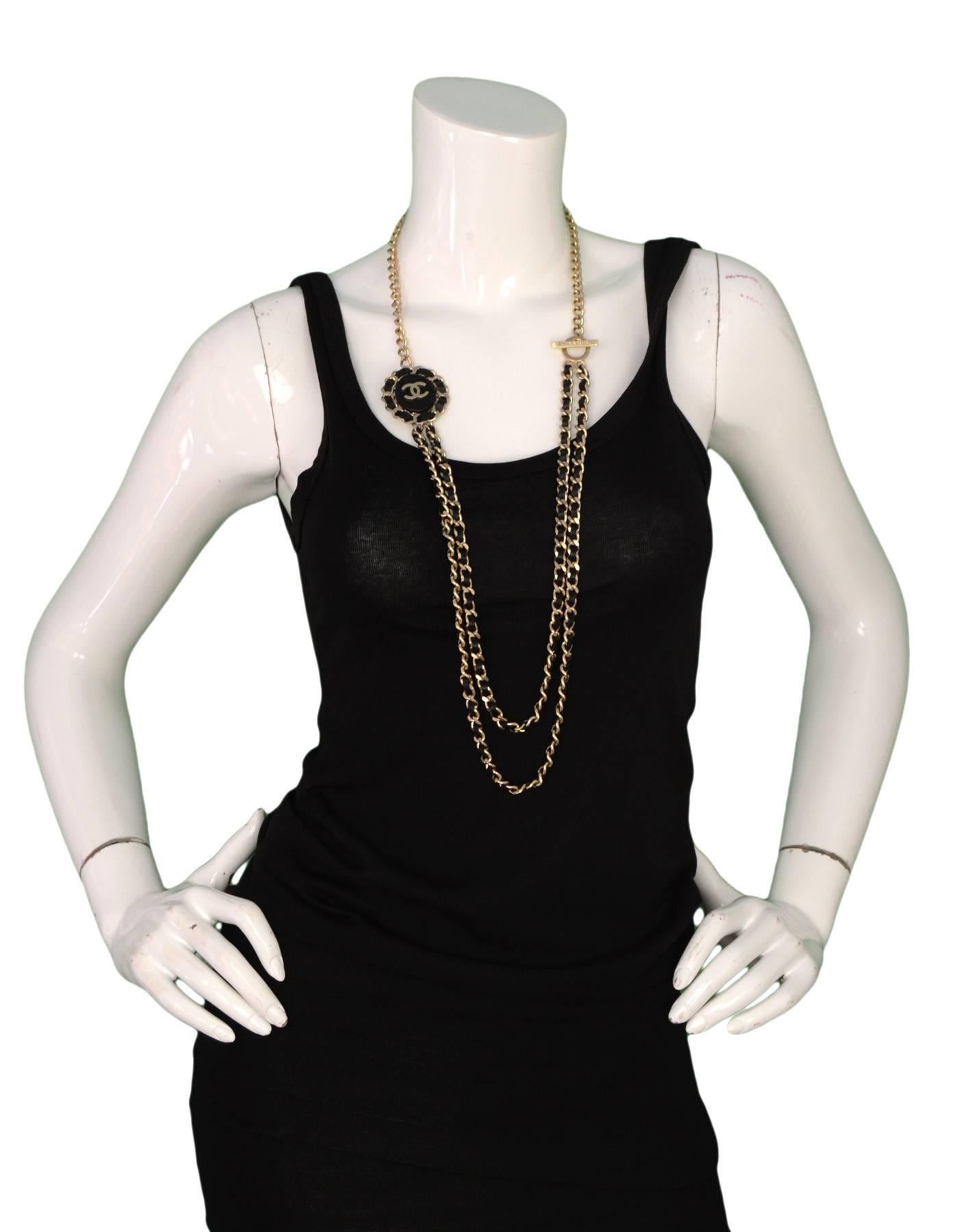 Chanel Goldtone and Black Leather Chain-Link Necklace
Can also be worn as a belt

MadeIn: Italy
Year of Production: 2016
Color: Goldtone and black
Stamped: Chanel B16 CC B Made In Italy
Materials: Metal and leather
Closure/opening: Hook and