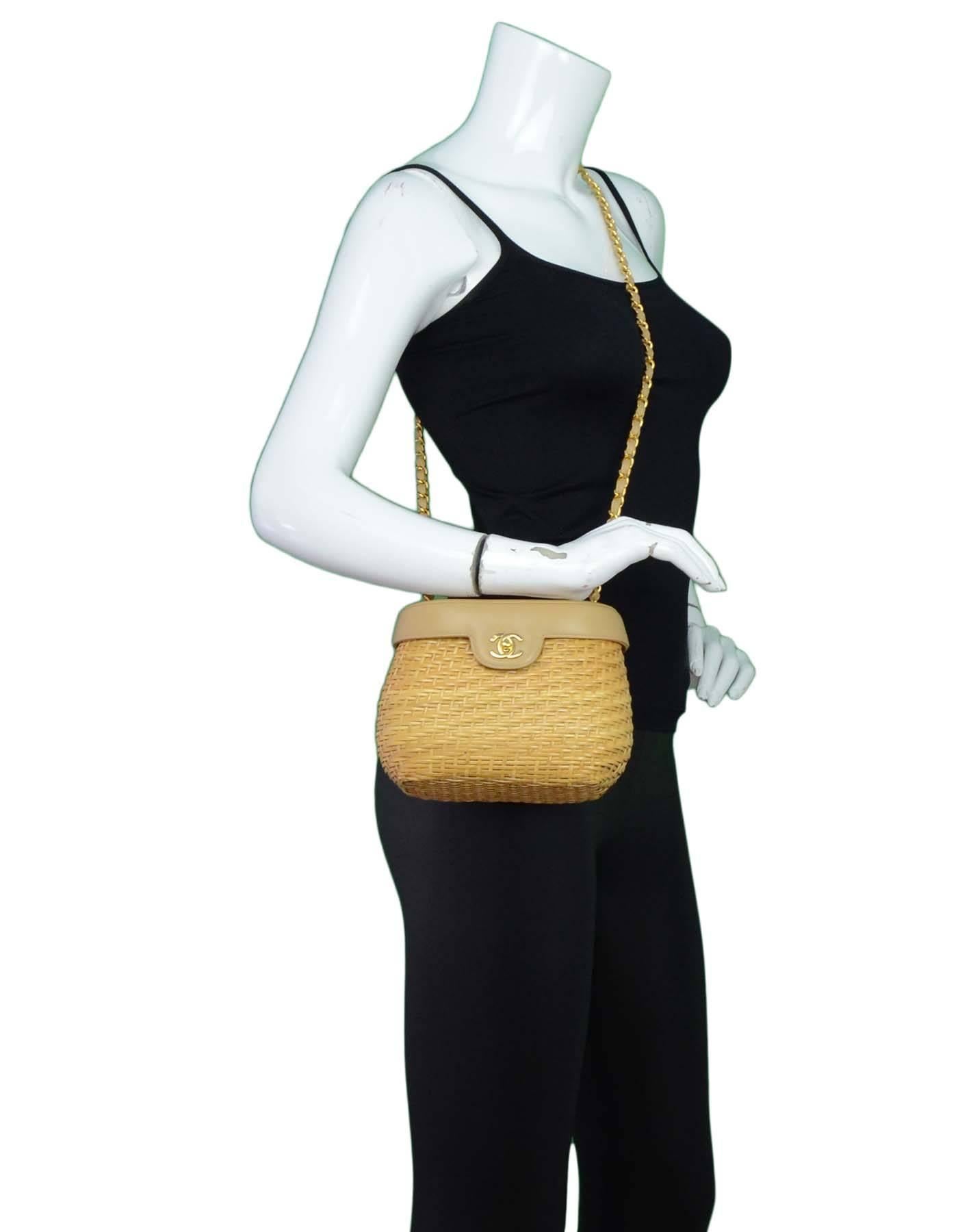 100% Authentic RARE Chanel Vintage Wicker Basket Crossbody Bag features leather flap top with signature goldtone CC twist lock closure.

Made In: Italy
Year of Production: 1997-1999
Color: Tan
Hardware: Goldtone
Materials: Wicker and