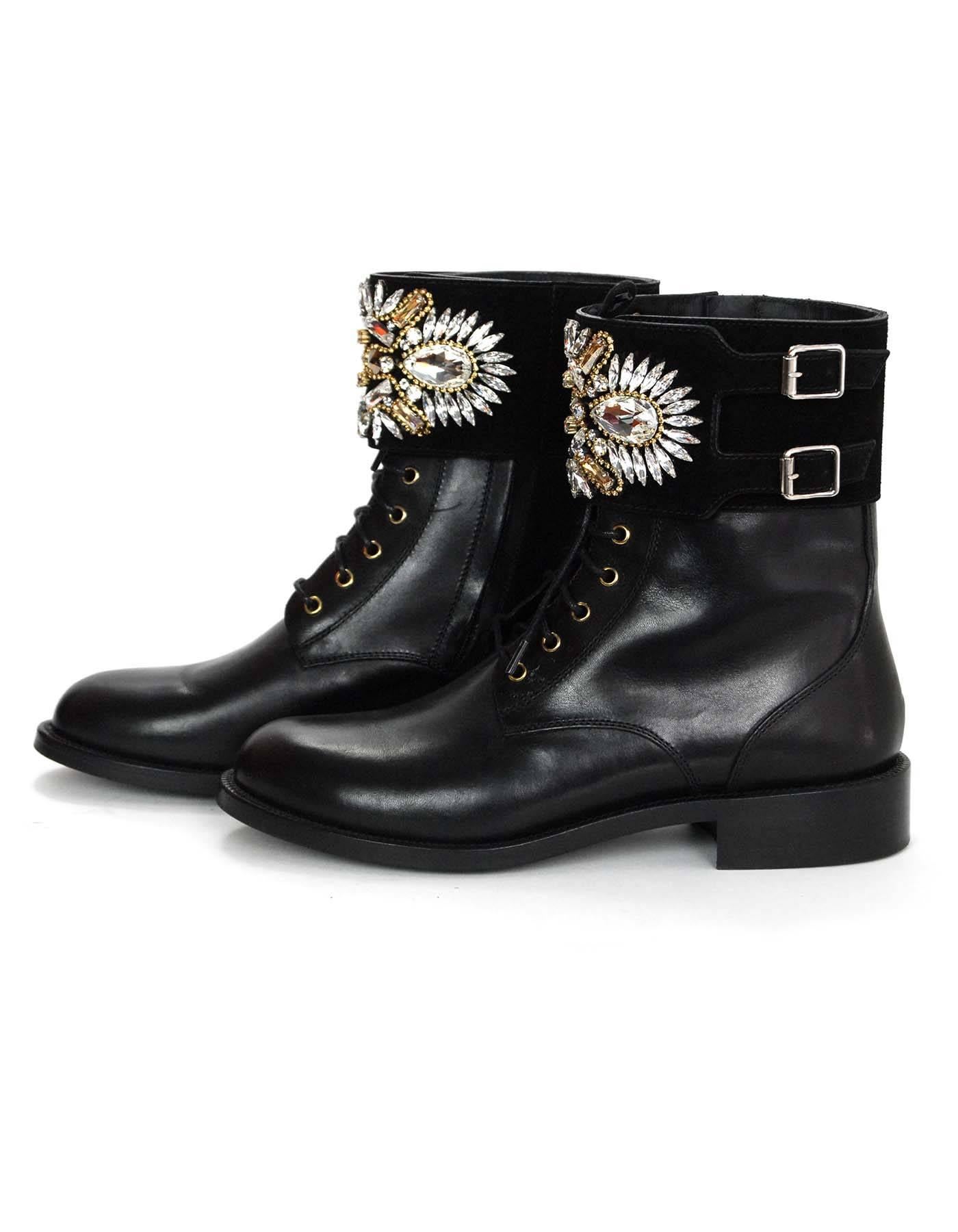 Rene Caovilla Black Leather and Jeweled Combat Boots Sz 38

Features crystal detail at suede ankle strap

Made In: Italy
Color: Black
Materials: Leather and suede
Retail Price: $1,525 + tax
Closure/Opening: Lace-up tie closure with double