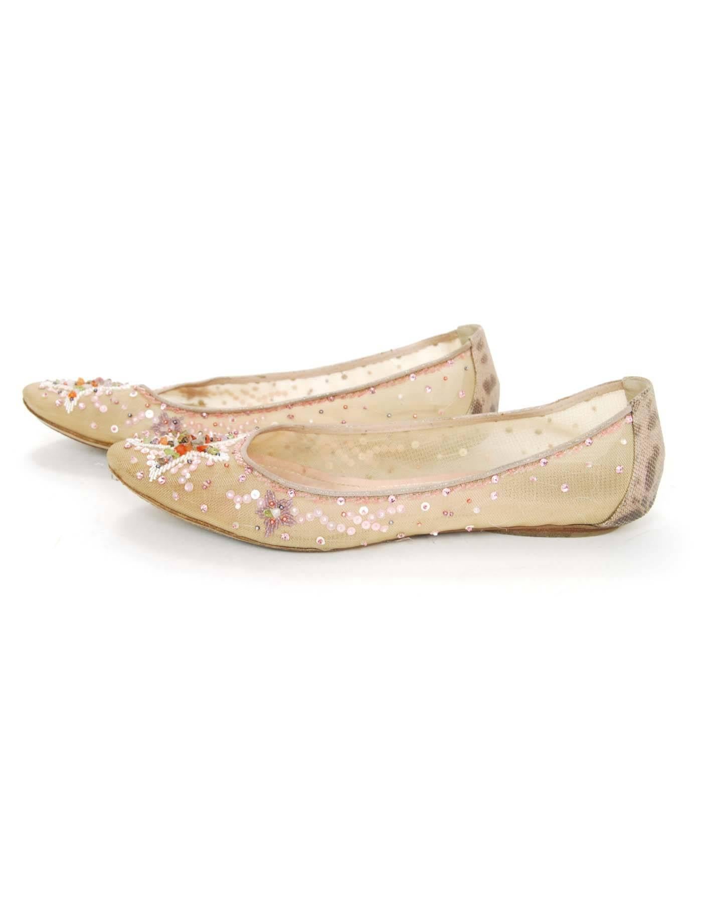 Rene Caovilla Beige Beaded Ballet Flats Sz 40

Features mesh and beading throughout 

Made In: Italy
Color: Beige and multi color beads
Materials: Mesh and beads
Closure/Opening: Slide on
Sole Stamp: Made in Italy 38
Overall Condition: Very