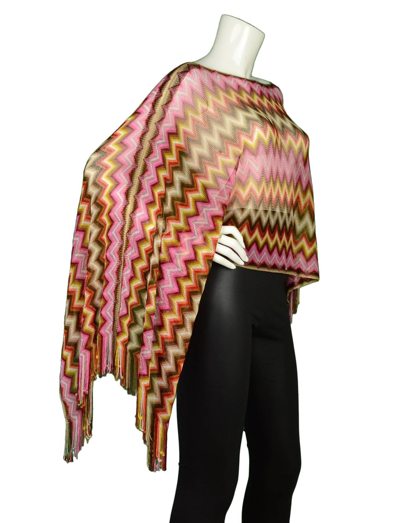 Missoni Multi-Color Knit Shawl

Features fringe detail

Made In: Italy
Color: Pink, purple, brown, orange
Composition: 100% Acetate
Overall Condition: Excellent pre-owned condition with the exception of one small snag at back left