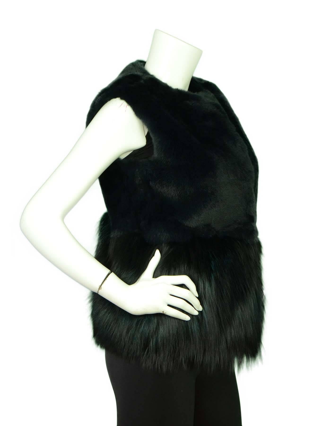 Co Bottle Green Fox and Rabbit Fur Vest Sz Small

Features oversize fit

Made In: China
Color: Bottle green
Composition: Rabbit and fox fur
Lining: 100% Silk lining
Retail Price: $3,500 + tax
Closure/Opening: Hook and eye closure
Exterior