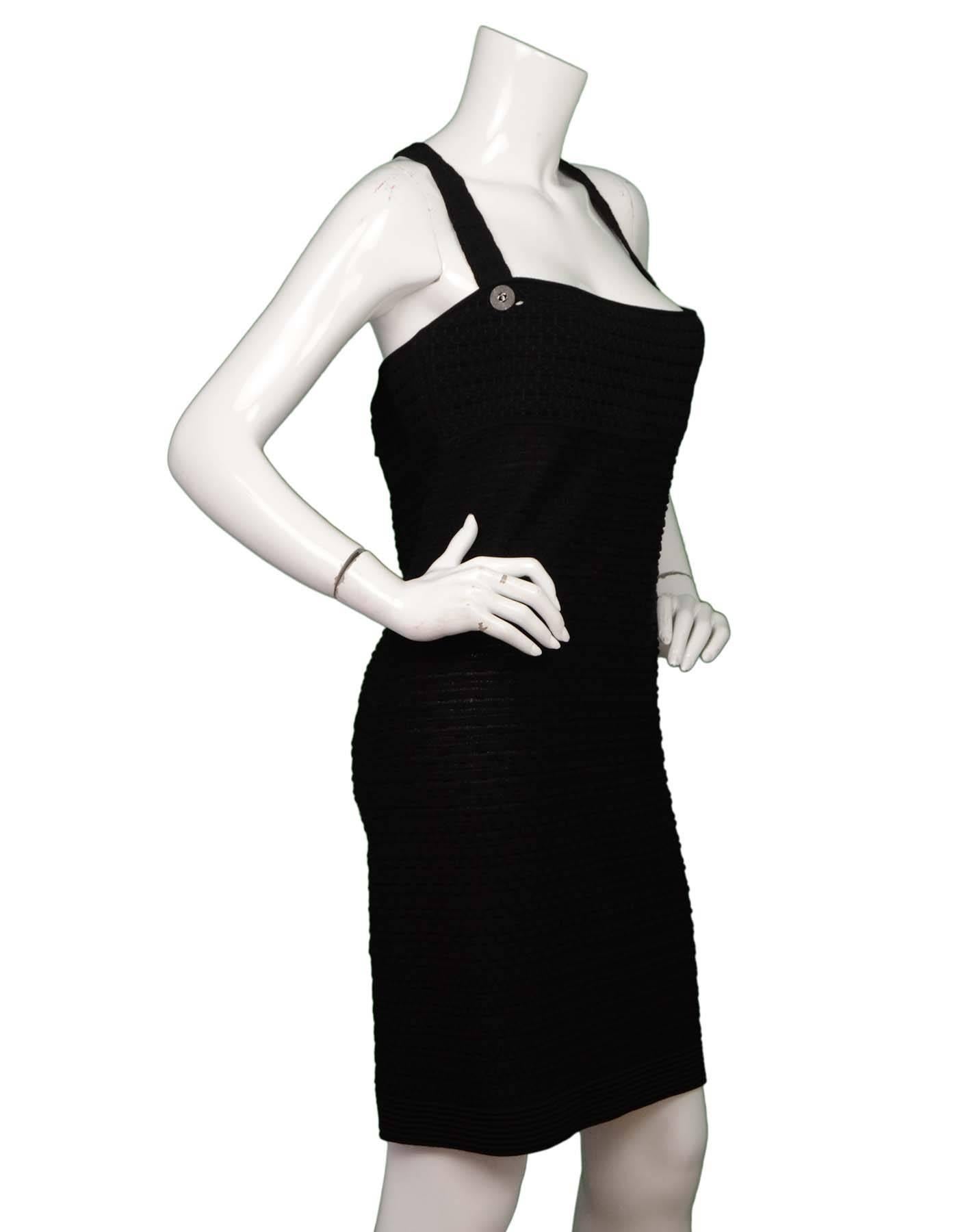 Chanel Black Textured Dress Sz 44 NWT

Made In: France
Year of Production: 2014
Color: Black
Retail Price: $2,900 + tax
Composition: 49% Rayon, 28% Cotton, 19% Nylon, 3% Polyester, 1% Spandex
Lining: None
Closure/Opening: Zip closure at