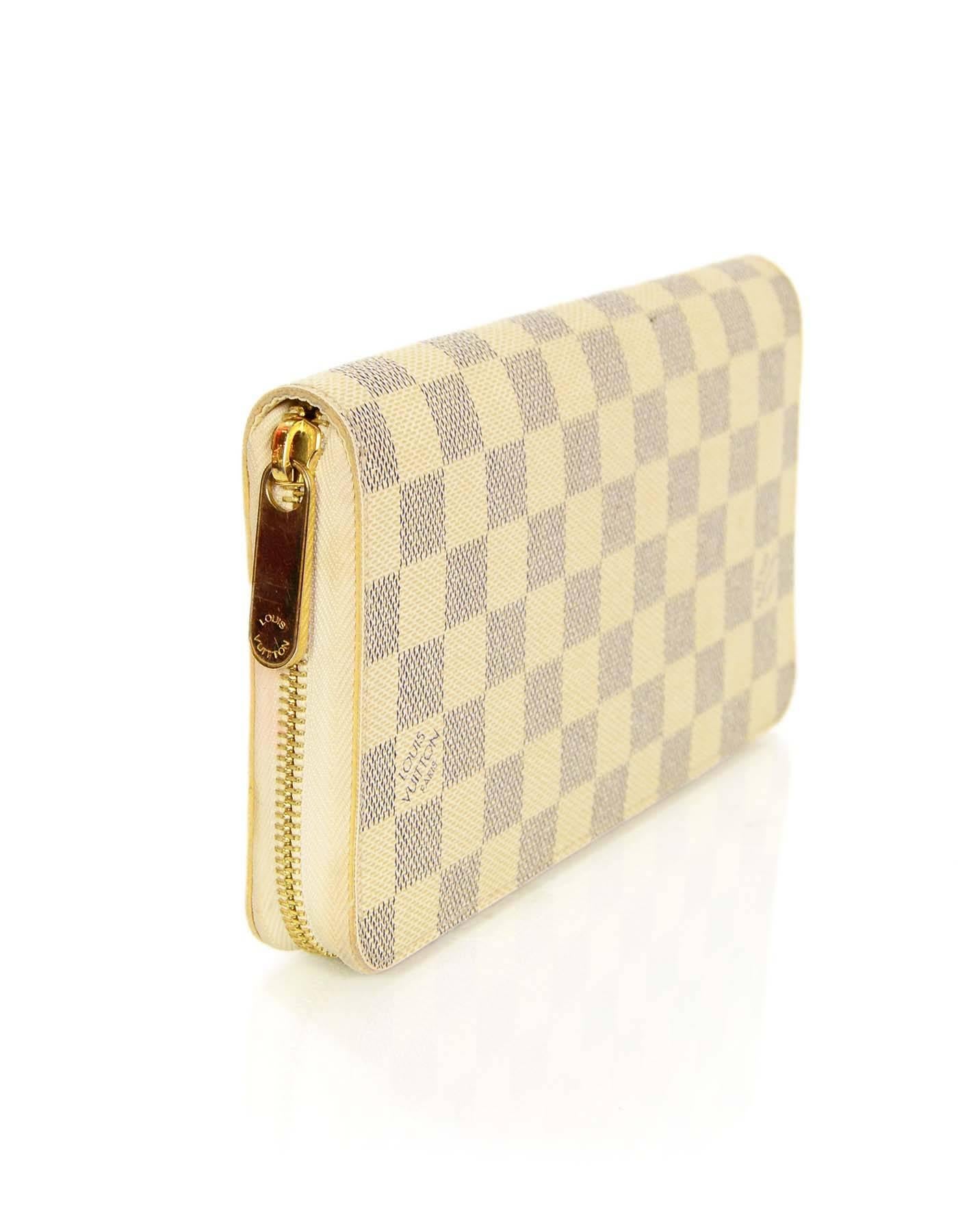 Louis Vuitton Damier Azur Zippy Organizer Wallet

Made In: France
Color: Blue and cream
Hardware: Goldtone
Materials: Coated canvas and metal
Year of Production: 2007
Serial Number/Date Code: VI3087
Lining: Cream coated