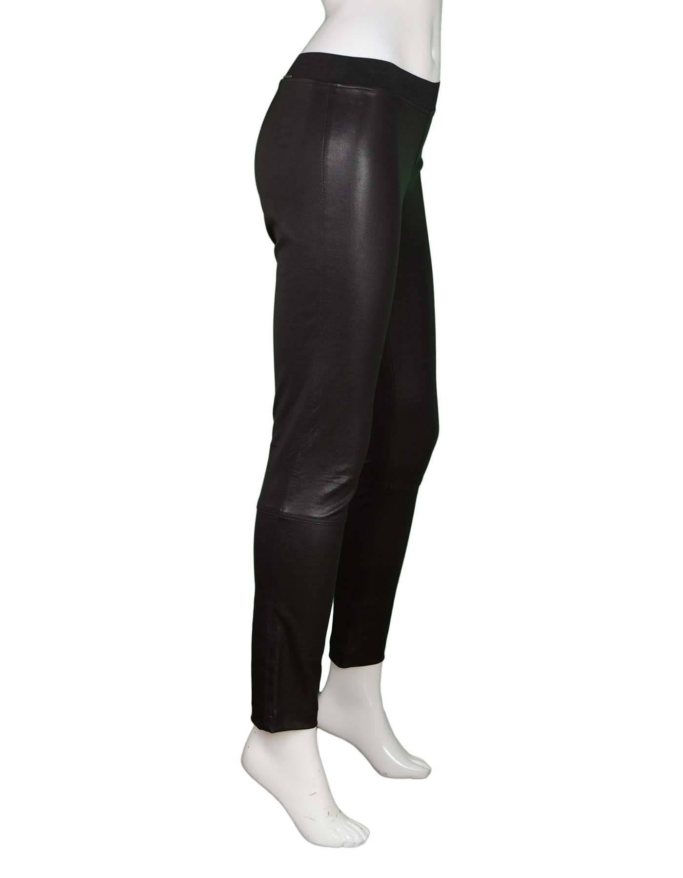 Elyse Overland Black Leather Leggings Sz 4

Features stretch waistband

Made In: USA
Color: Black
Closure/Opening: Side zip closure with double hook and eye
Exterior Pockets: None
Interior Pockets: None
Retail Price: $1,550 + tax
Overall