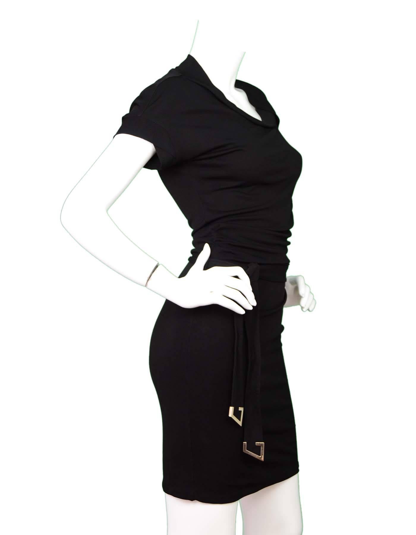 Gucci Black Dress with Belt Sz S

Features short sleeves and cowl neckline with tie belt at wasit

Made In: Italy
Color: Black
Composition: 100% Rayon
Lining: None
Closure/Opening: Hidden side zip closure
Overall Condition: Excellent