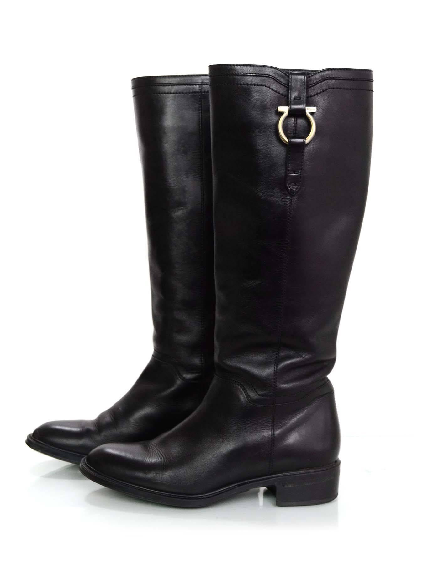 Salvatore Ferragamo Black Leather Boots Sz 5.5

Made In: Italy
Color: Black
Materials: Leather, metal
Closure: Pull up
Sole Stamp: Salvatore Ferragamo Made in Italy
Overall Condition: Very goof pre-owned condition with the exception of very