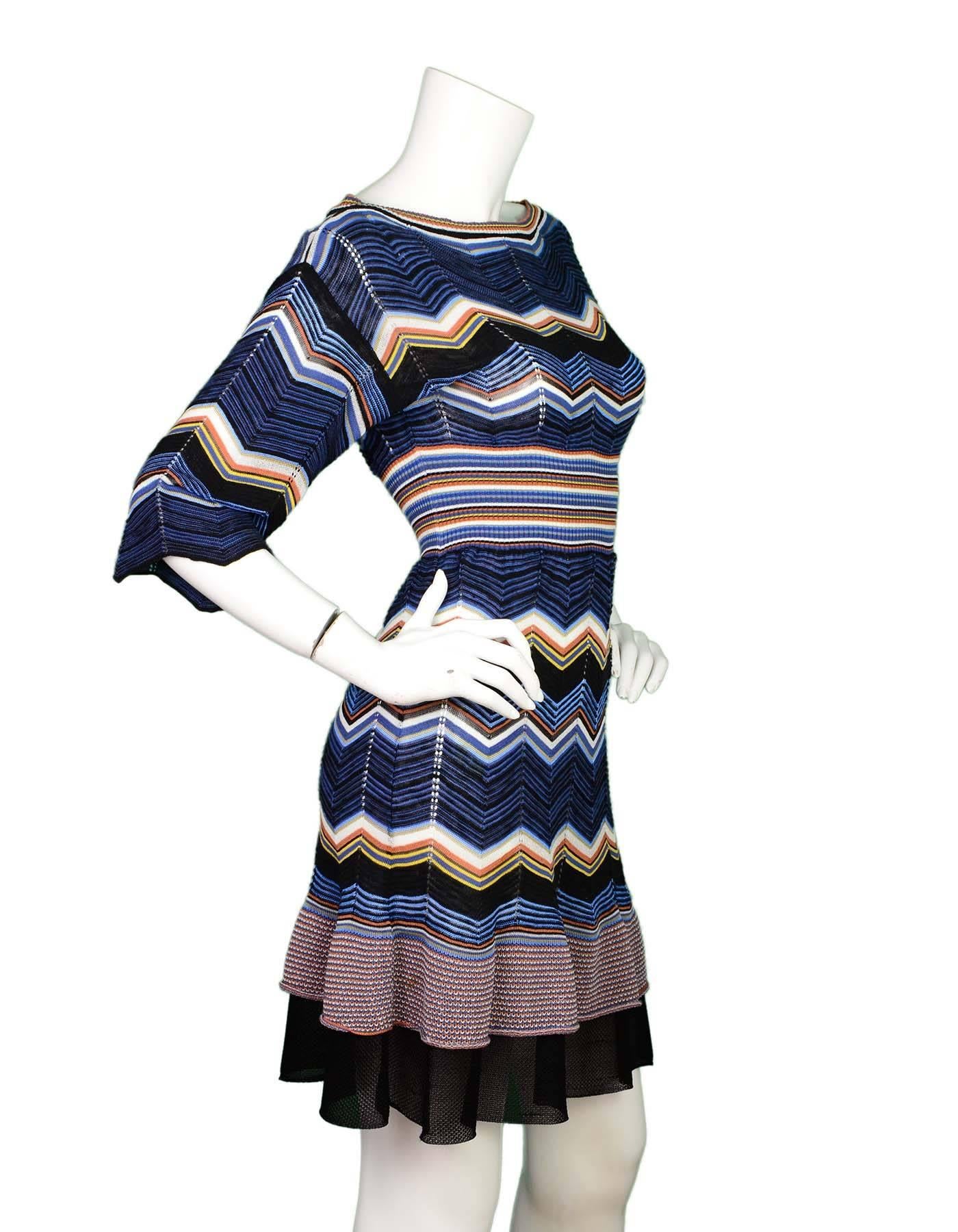 Missoni Blue & Orange ZigZag Knit Dress 
Features jagged 3/4 length sleeves

Made In: Italy
Color: Navy, blue, black, orange, yellow, and white
Composition: 55% cotton, 41% viscose, 3% flax, 1% polyamide
Lining: 100%