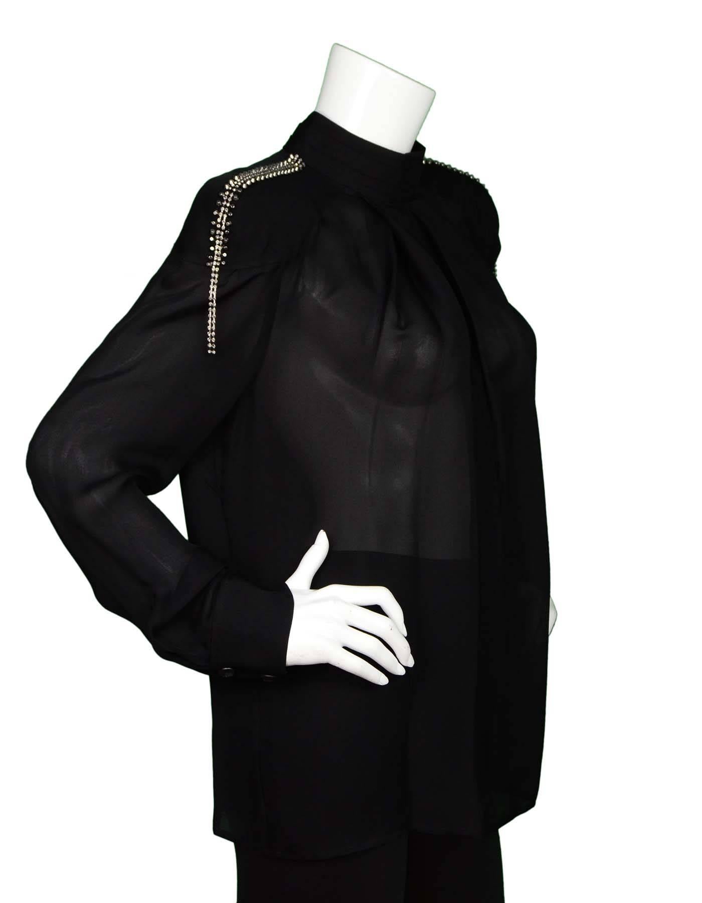 Pierre Balmain Black Blouse with Beading Sz 42 NWT
Features exaggerated shoulder padding and beaded detail

Made In: China
Color: Black
Composition: 63.6% Viscose, 36.4% Mulbery Silk
Lining: None
Closure/Opening: Pull over with button closure