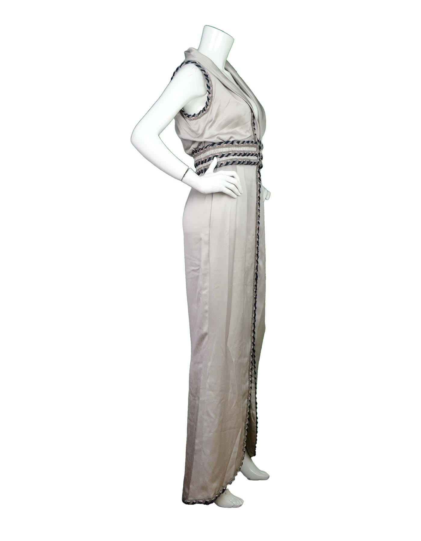 Chanel Grey Long Silk Dress with Tweed Trim Sz 40 NWT

Features draped lapels and tweed trim

Made In: France
Year of Production: 2008 Autumn
Color: Grey, blue, pink
Composition: 100% Silk
Lining: Grey 100% Silk
Closure/Opening: Hidden