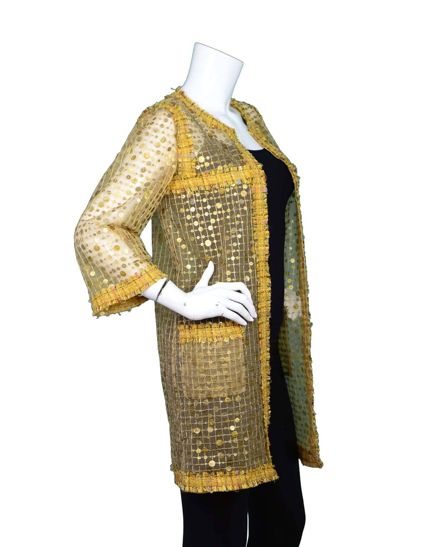 Chanel Sheer Gold Sequin and Tweed Jacket
Features antique gold sequin and metallic threading throughout

Color: Gold
Composition: Not listed
Lining: None - sheer
Closure/Opening: Single hidden front hook and eye closure
Exterior Pockets: Two