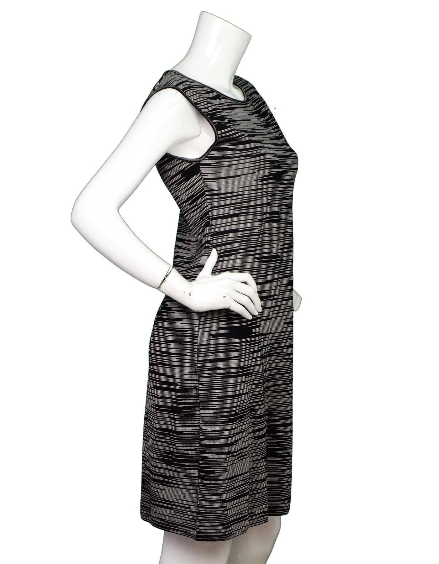 M Missoni Black and White Sleeveless Dress Sz 46

Made In: Italy
Color: Black and white
Composition: Not listed
Lining: None
Closure/Opening: Pull over
Exterior Pockets: None
Interior Pockets: None
Overall Condition: Excellent pre-owned